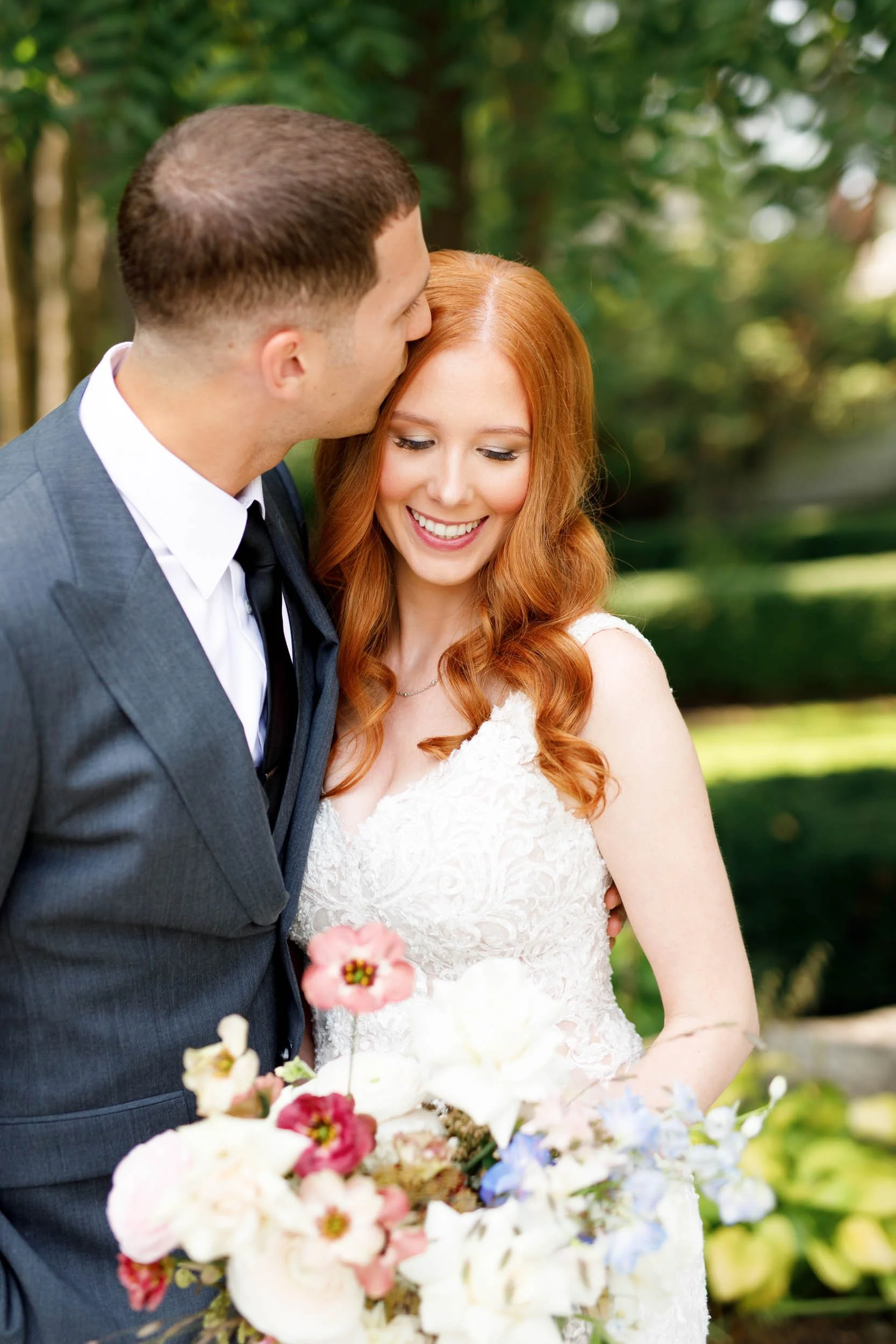 Bride and groom sharing a kiss at The Doctor’s House in Kleinburg, Ontario