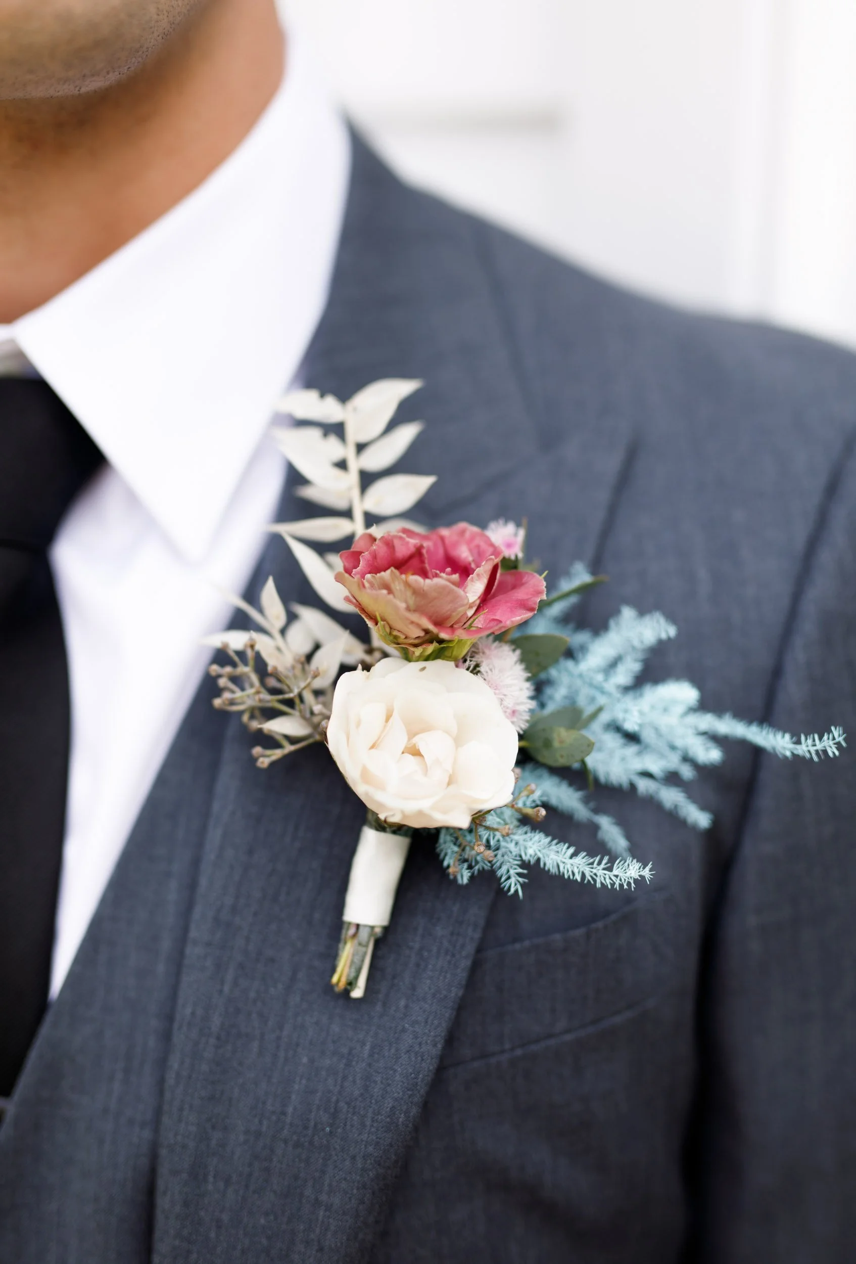 Groom boutonniere detail at The Doctor’s House in Kleinburg wedding