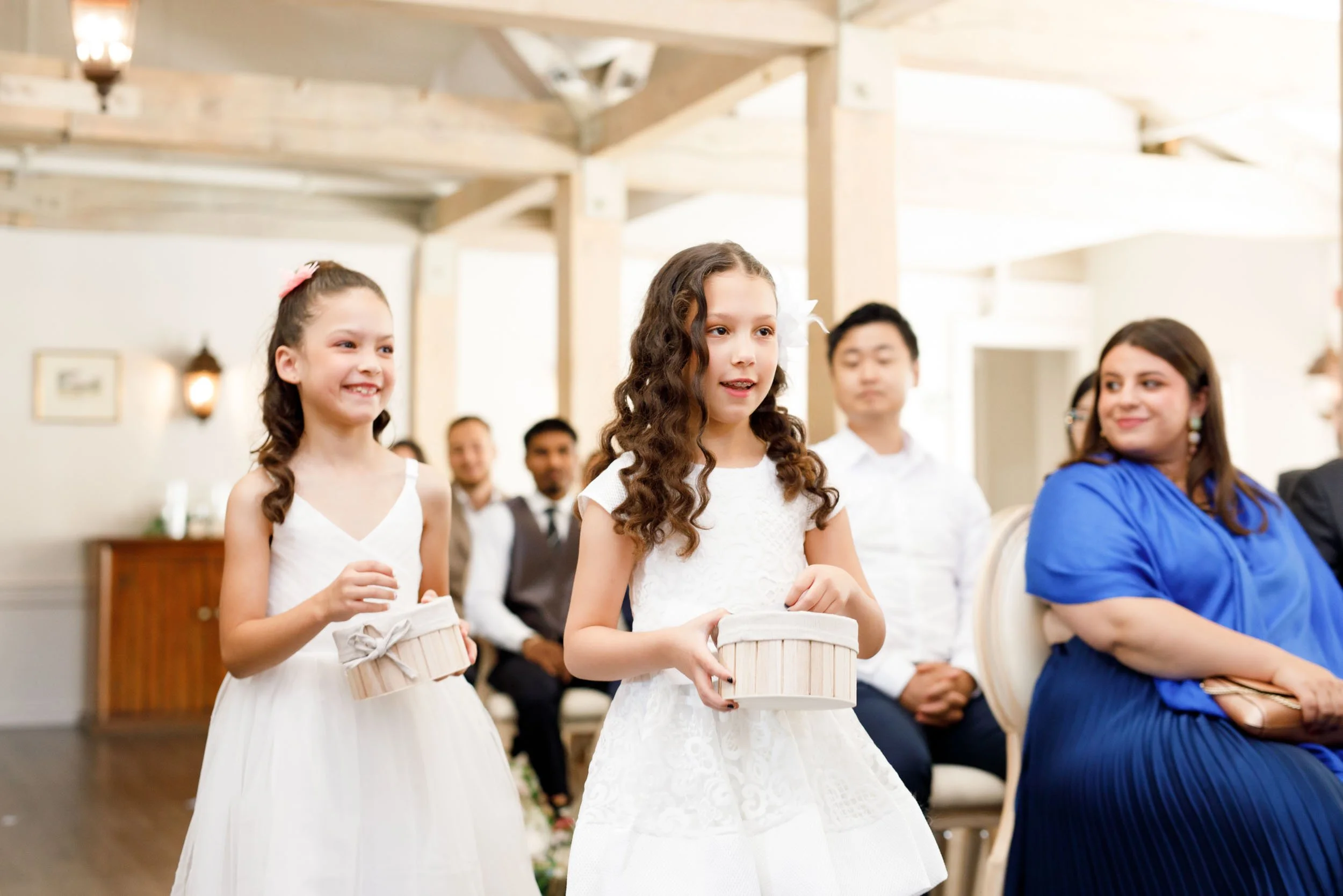 Flower girls during ceremony at The Doctor’s House in Kleinburg, Ontario