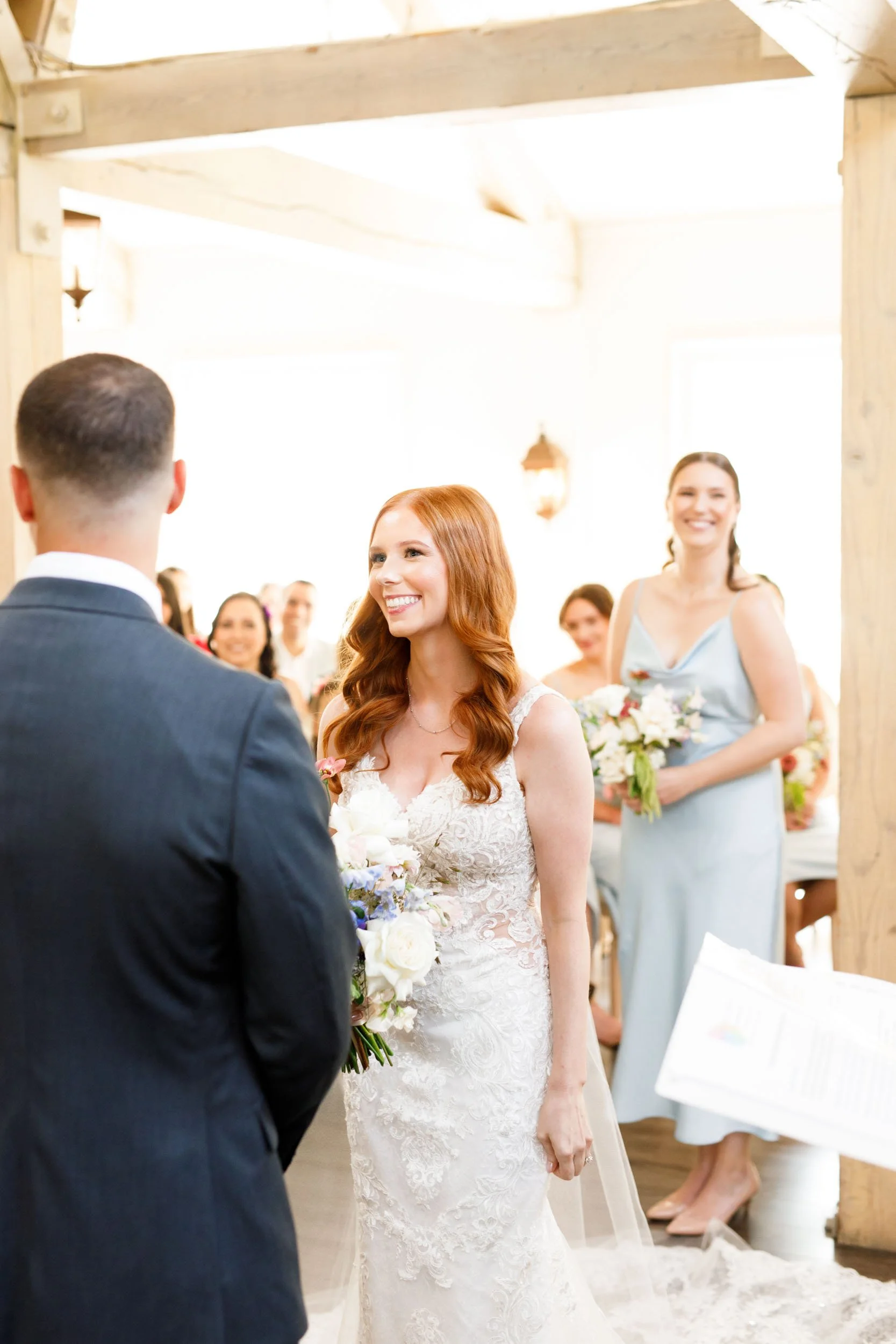 Bride and groom standing at altar at The Doctor’s House in Kleinburg wedding