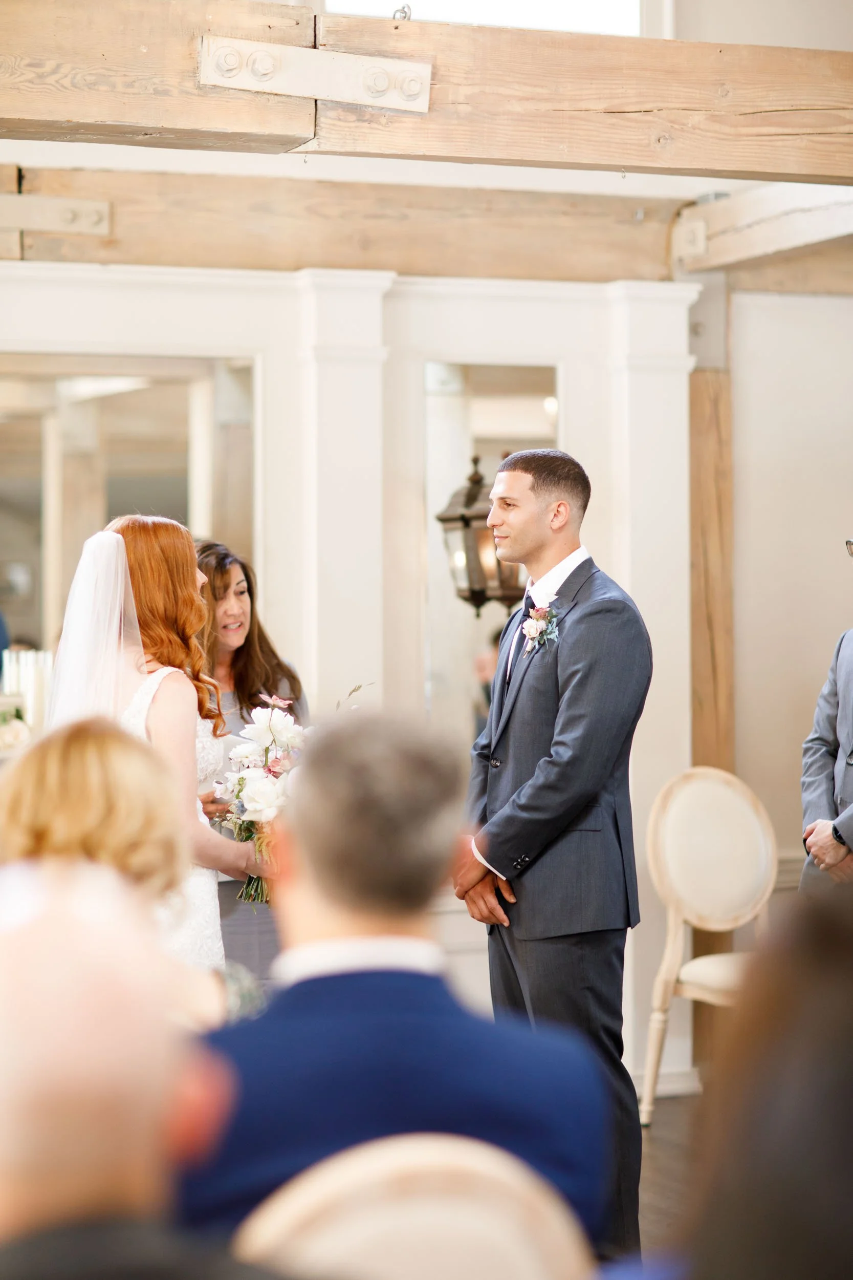Bride and groom exchanging vows at The Doctor’s House in Kleinburg