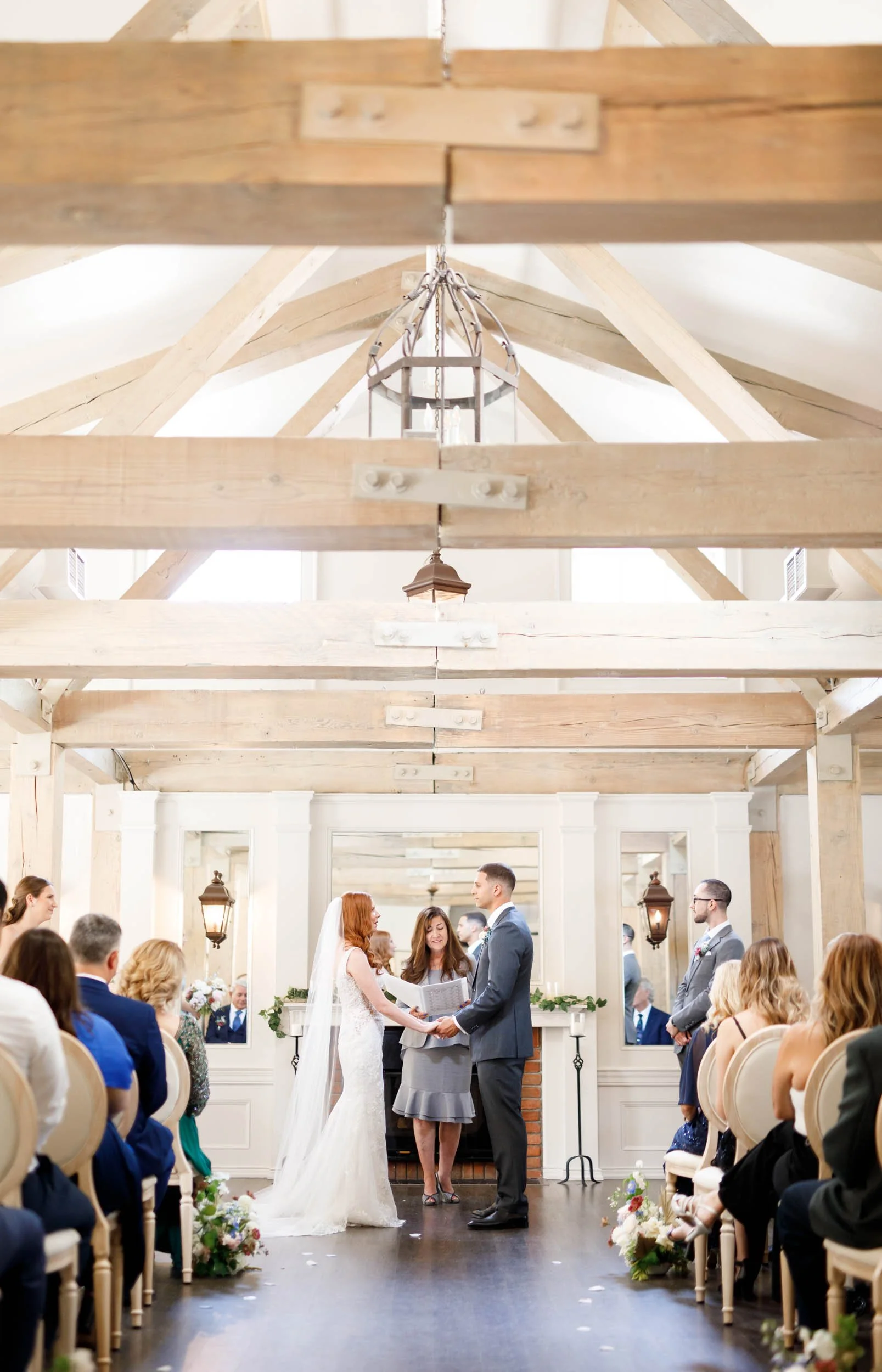 Wide view of indoor wedding ceremony at The Doctor’s House in Kleinburg