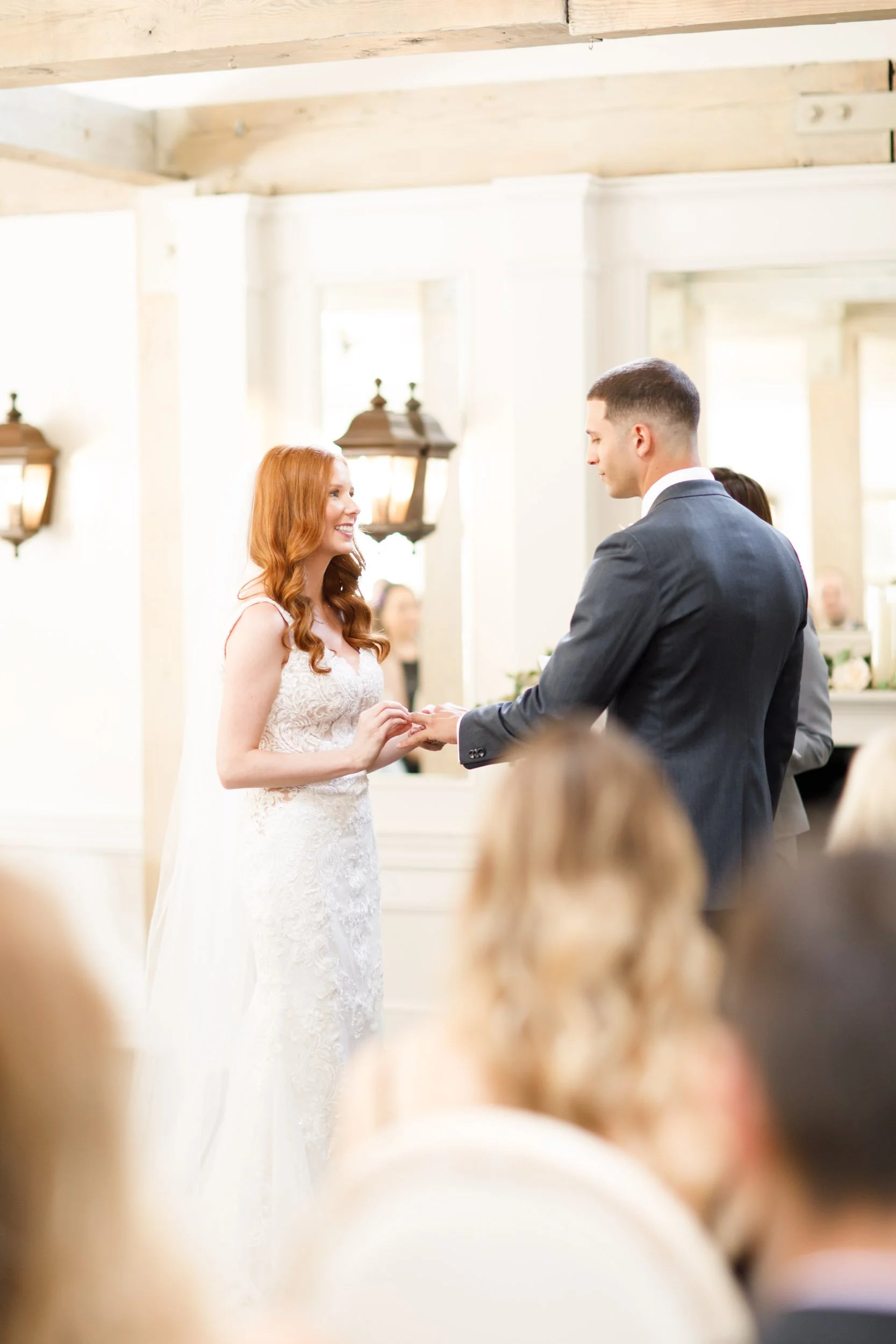 Bride and groom exchanging rings at The Doctor’s House in Kleinburg wedding