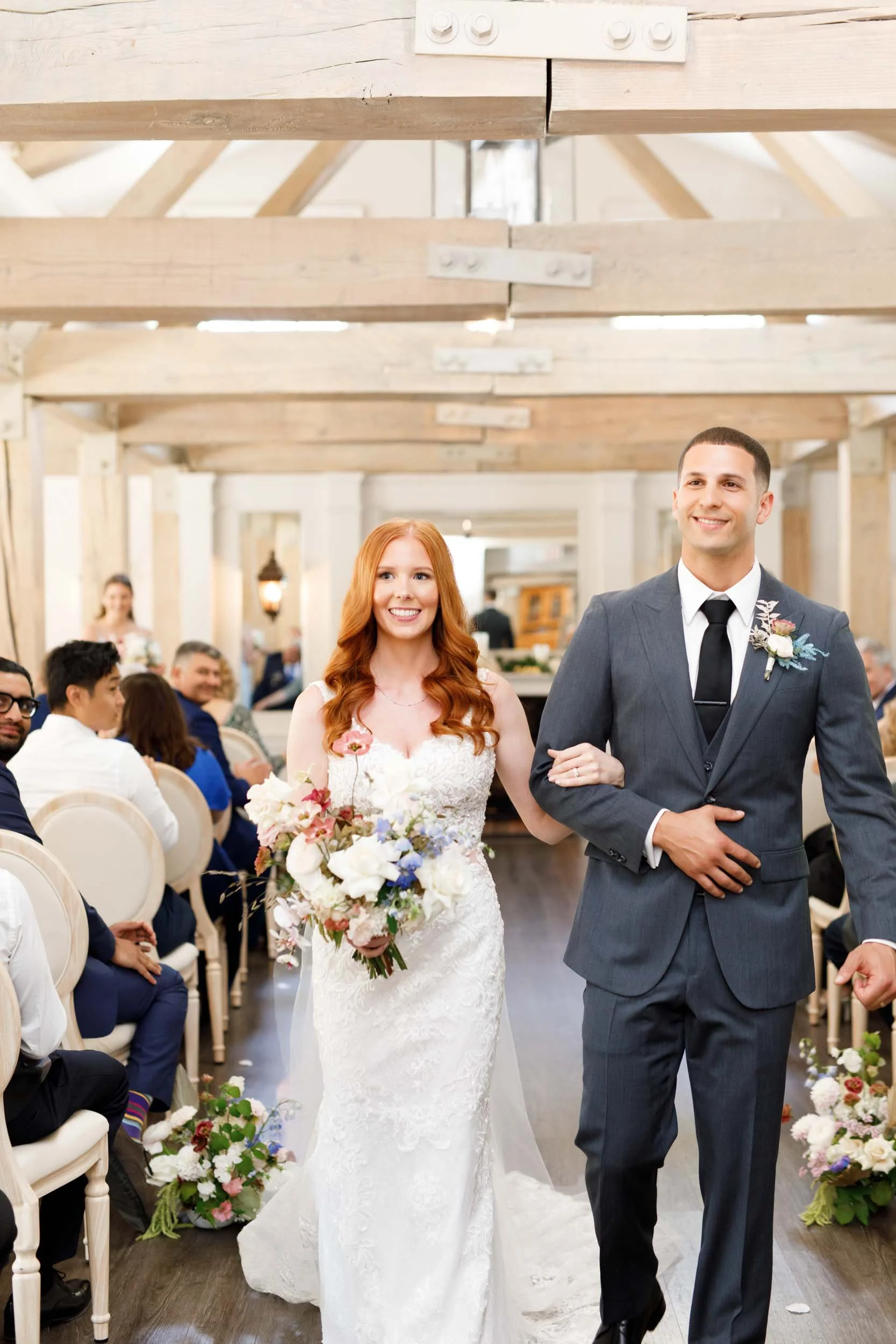 Bride and groom walking back up the aisle at The Doctor’s House in Kleinburg wedding