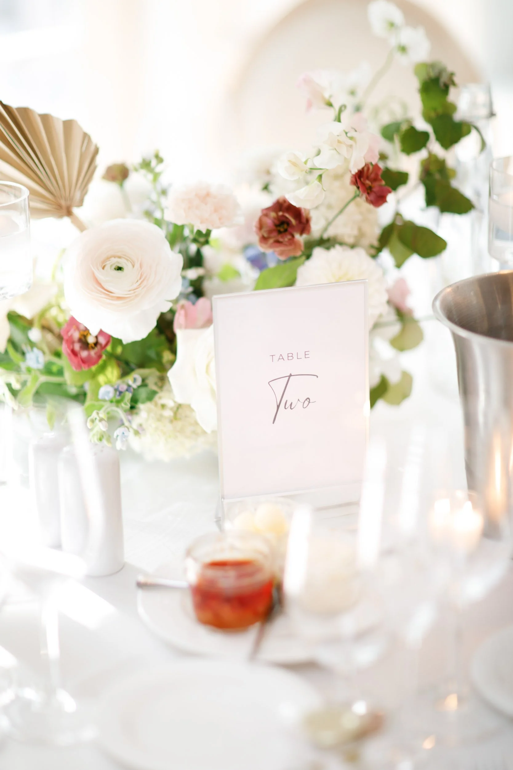 Wedding table centerpiece with florals at The Doctor’s House in Kleinburg