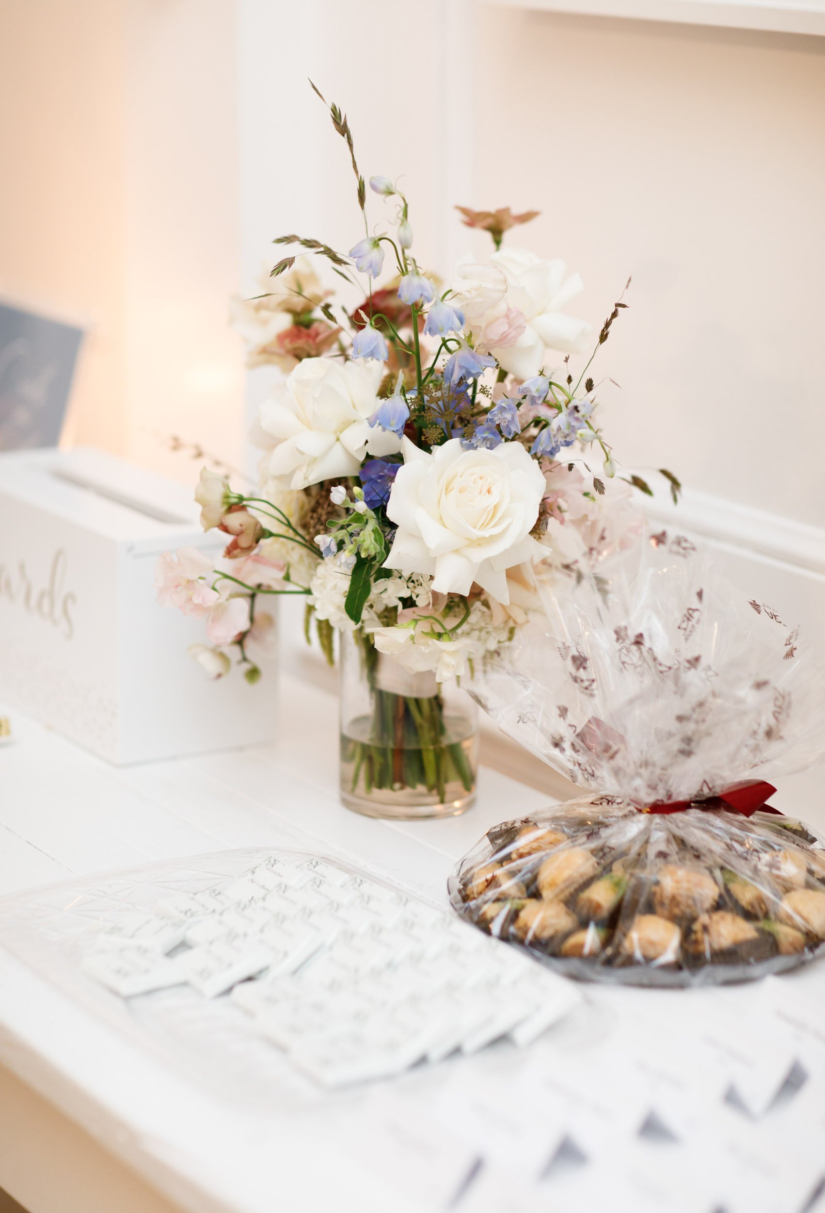 Wedding cake table with florals at The Doctor’s House in Kleinburg, Ontario