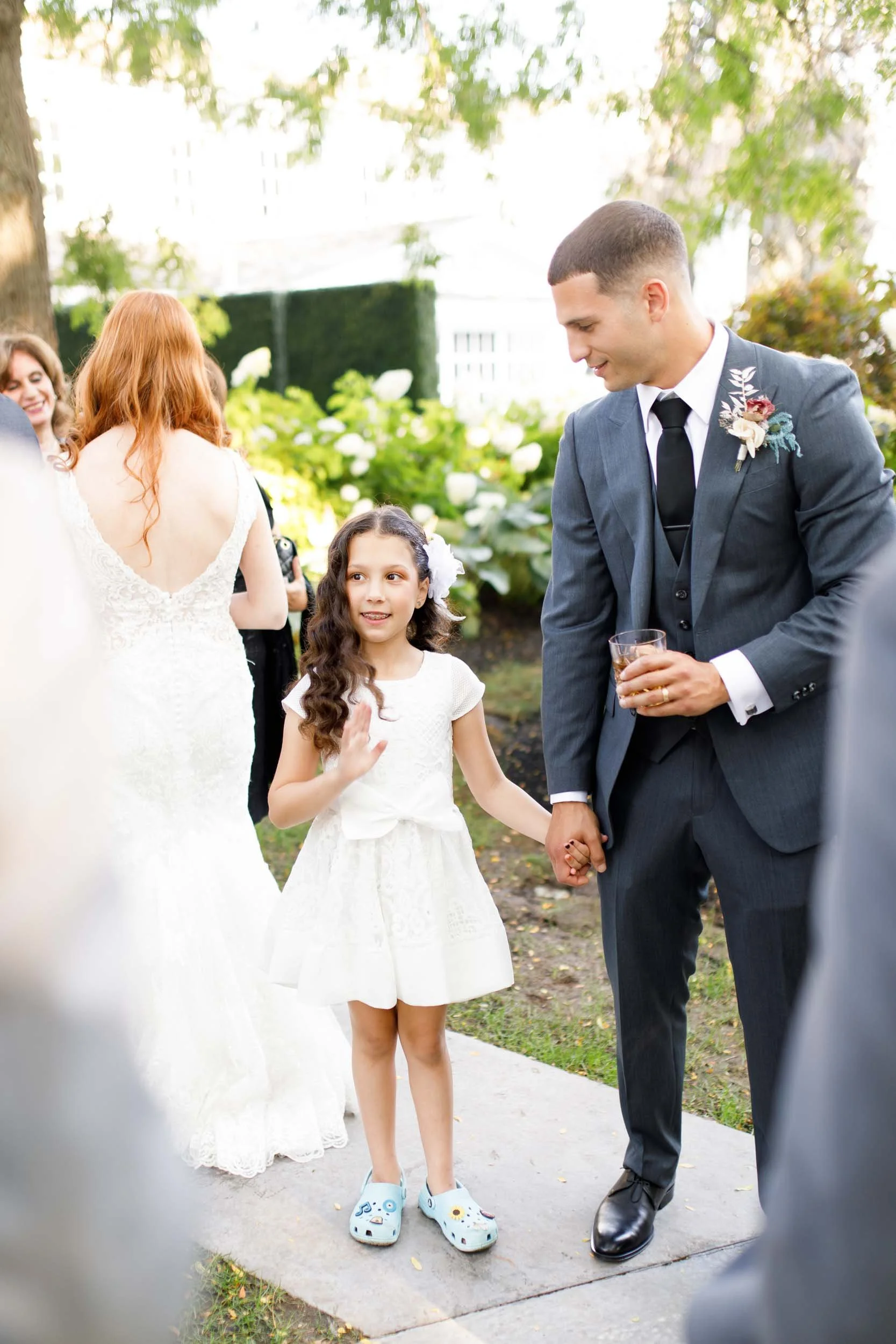 Groom with flower girl at The Doctor’s House in Kleinburg wedding