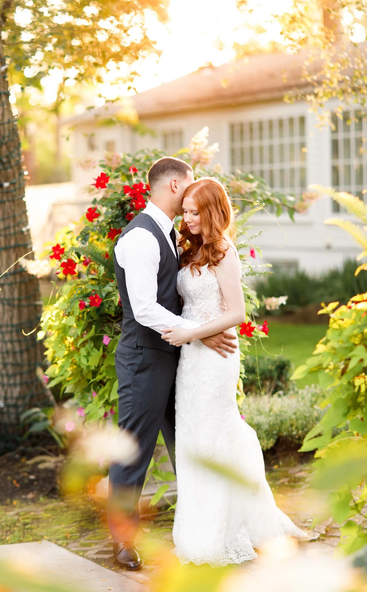 Bride and groom embracing outdoors at The Doctor’s House in Kleinburg