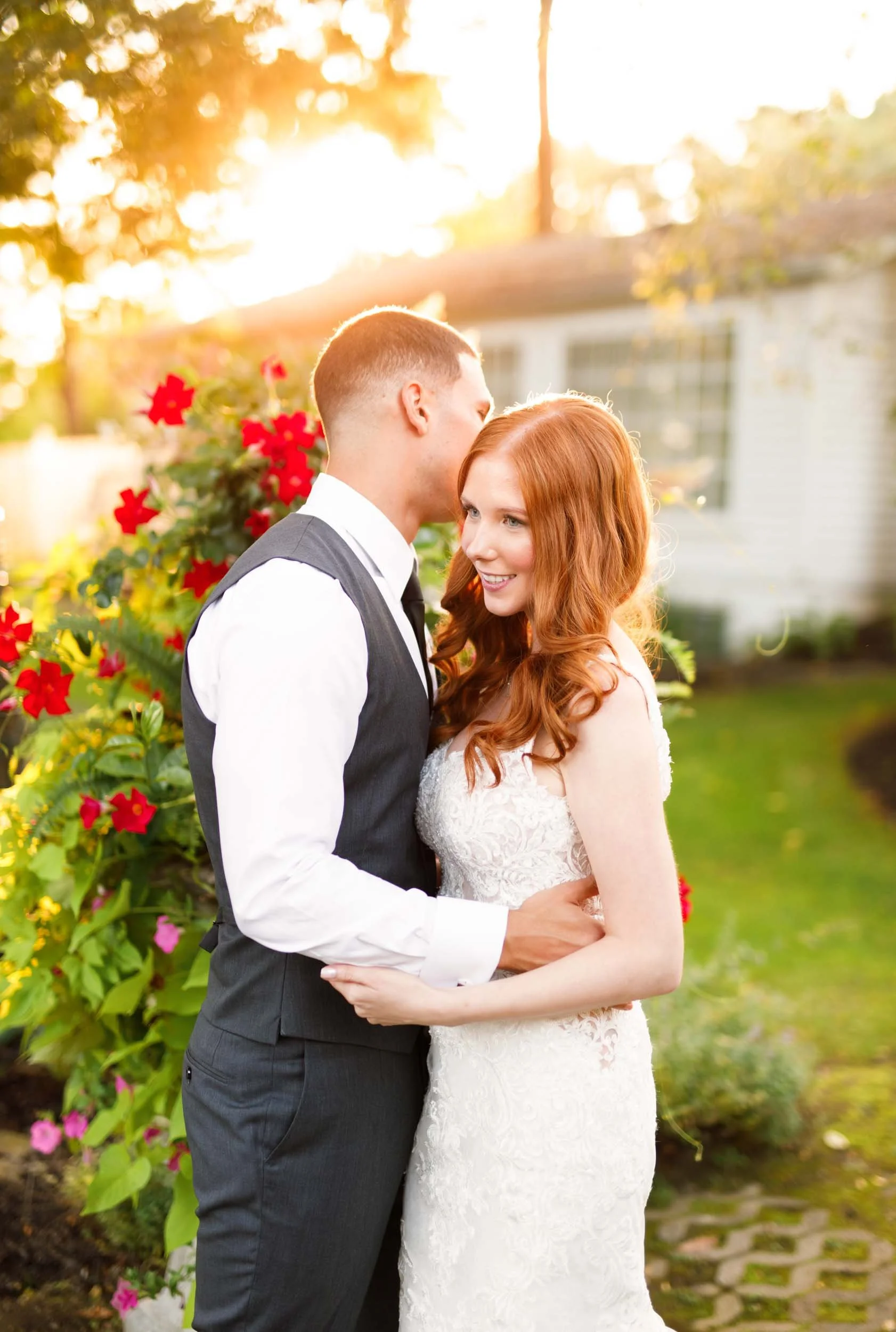 Bride and groom kissing at golden hour at The Doctor’s House in Kleinburg wedding