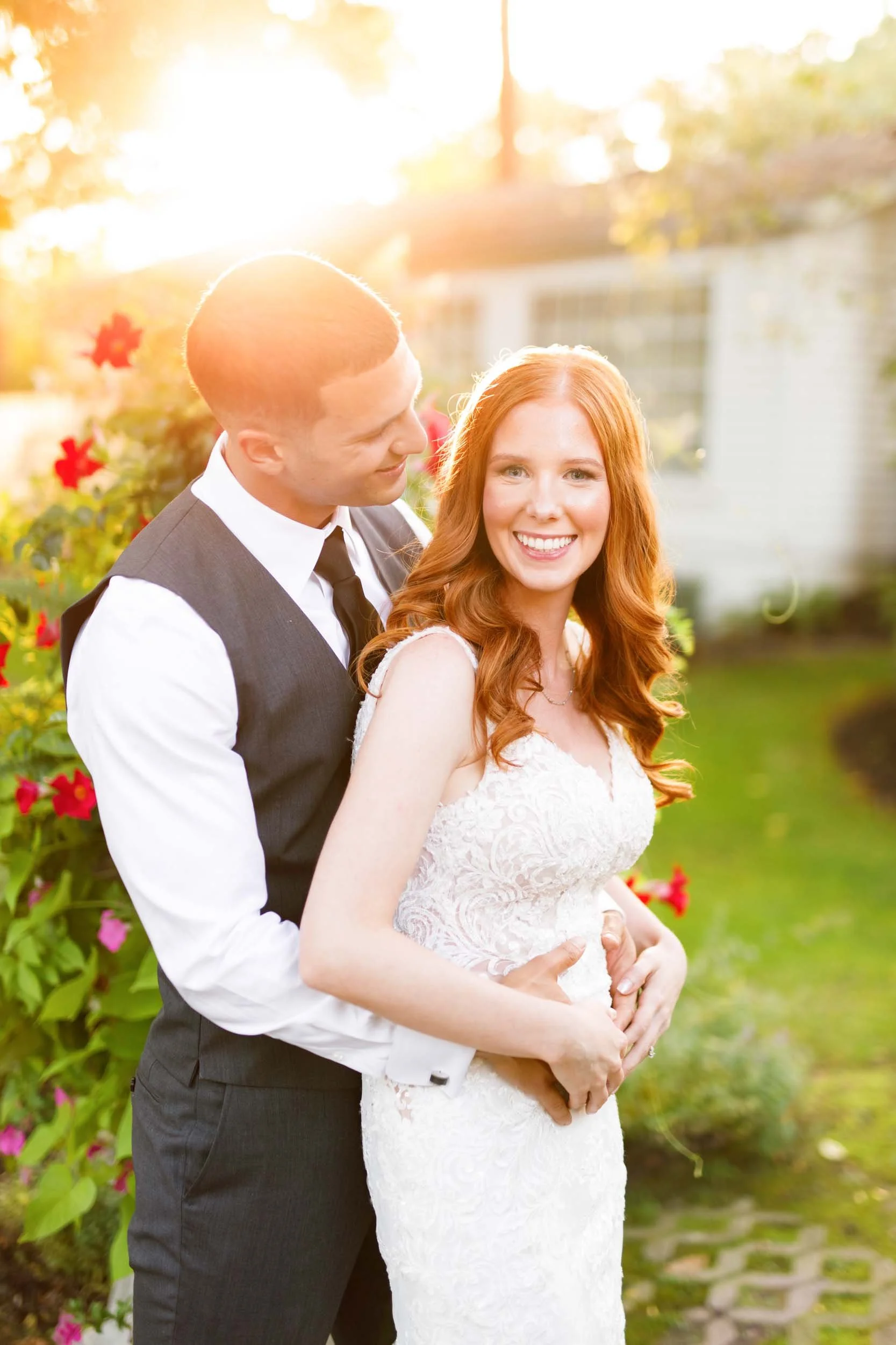 Bride and groom embracing at sunset at The Doctor’s House in Kleinburg, Ontario