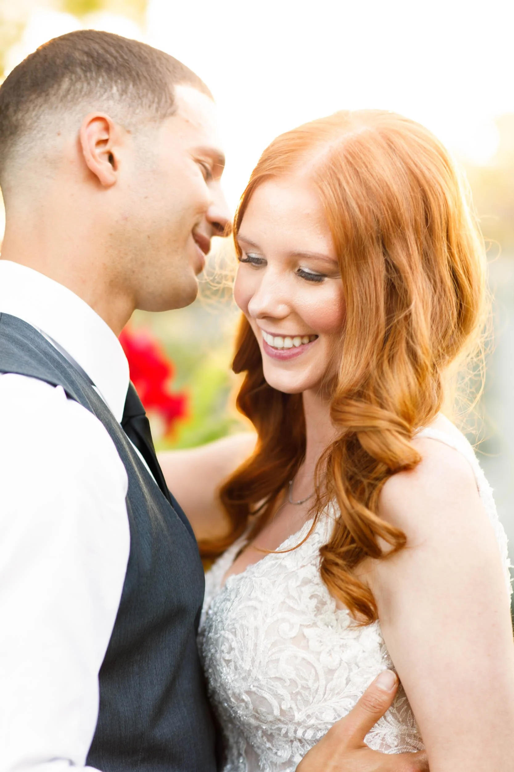 Bride smiling with groom at The Doctor’s House in Kleinburg, Ontario wedding