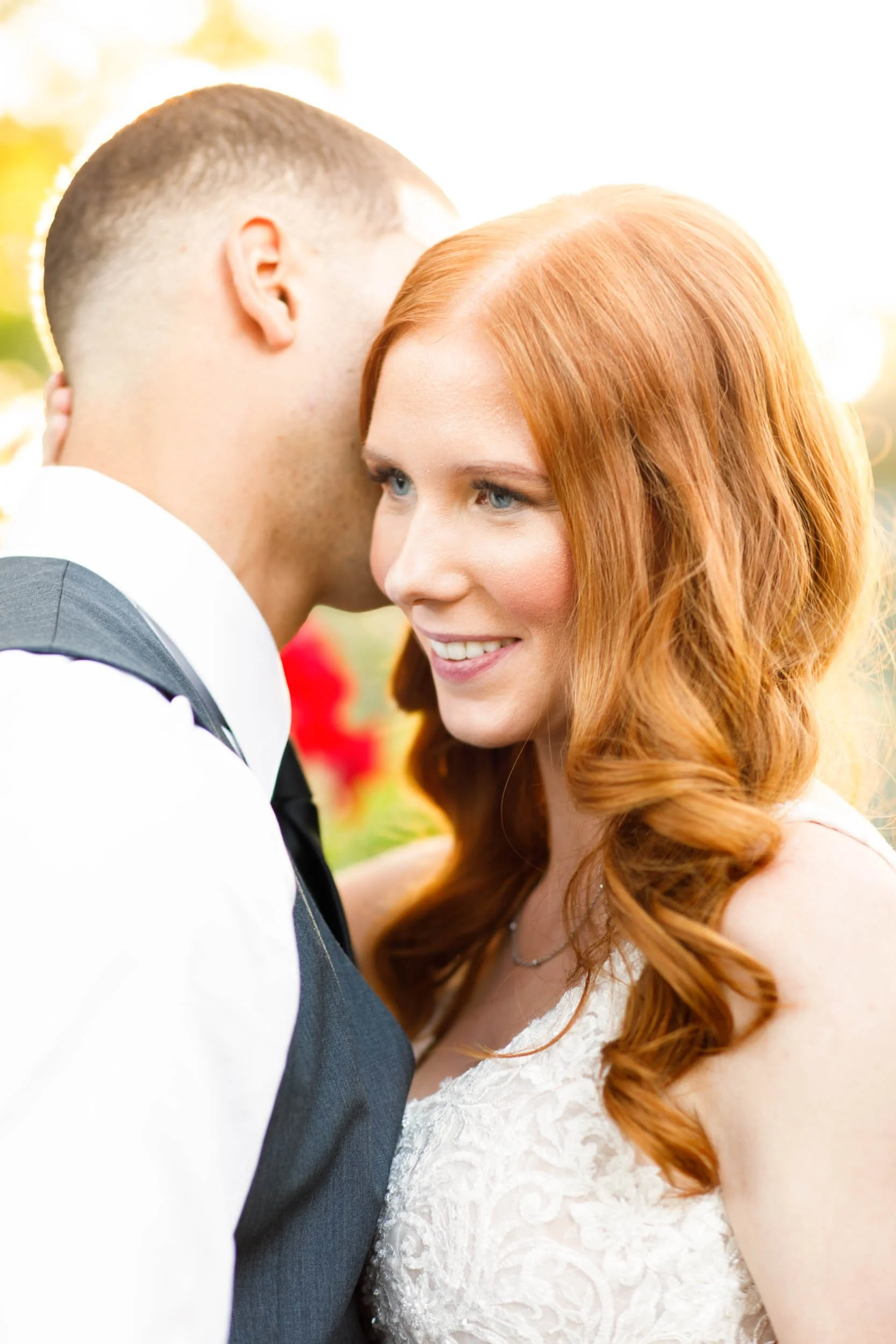 Bride and groom laughing together at The Doctor’s House in Kleinburg, Ontario