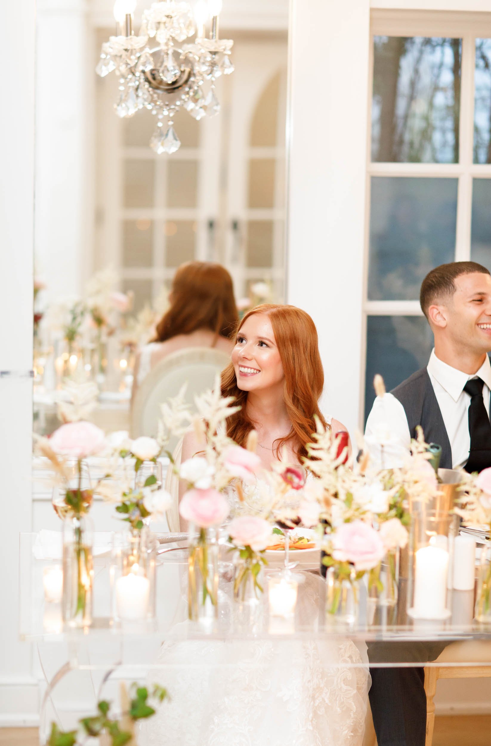Bride and groom smiling at reception at The Doctor’s House in Kleinburg wedding