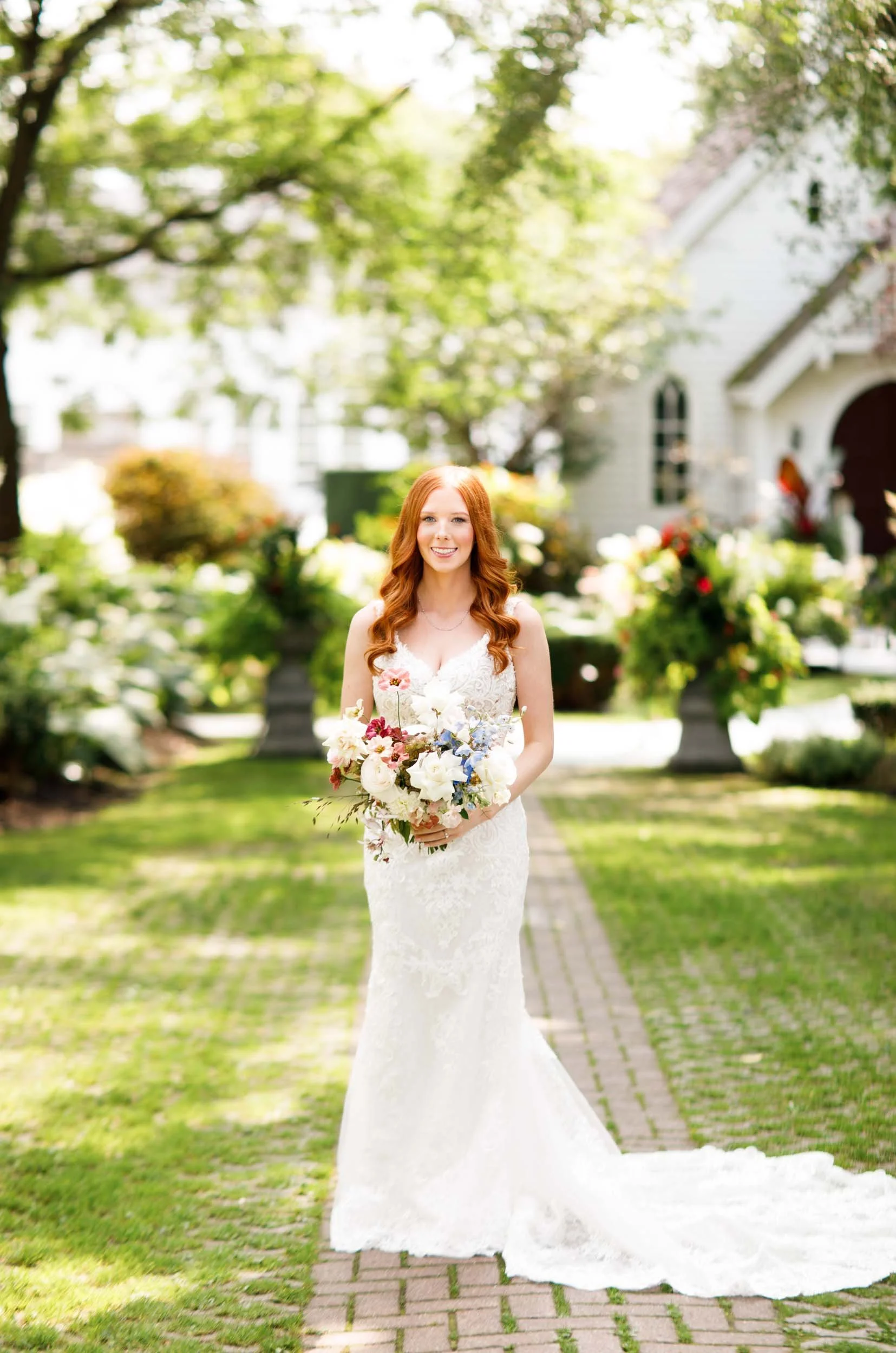 Outdoor bridal portrait in sun-drenched light at The Doctor’s House in Kleinburg, Ontario