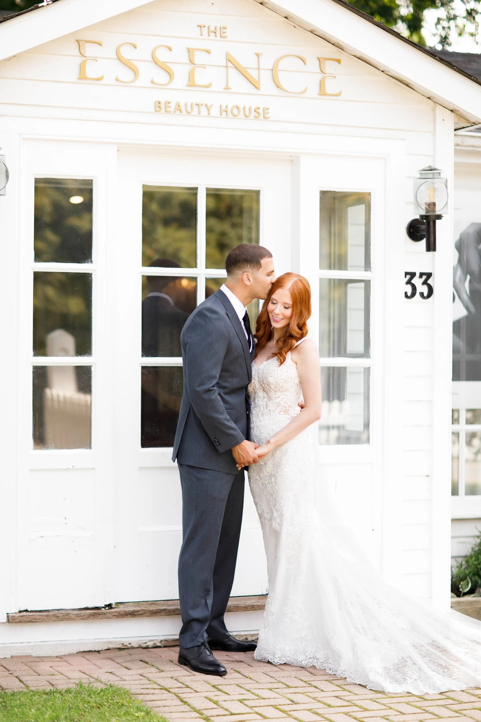 Bride and groom standing at Essence building at The Doctor’s House in Kleinburg wedding