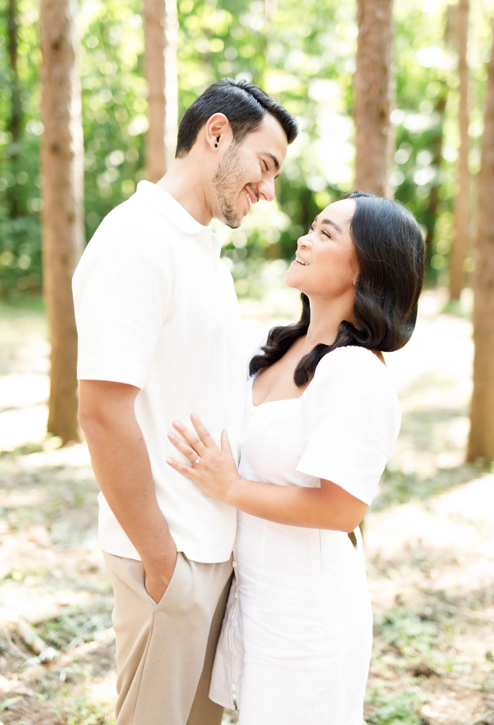 Close-up of couple embracing in the forest at Kortright Centre in Woodbridge, Ontario