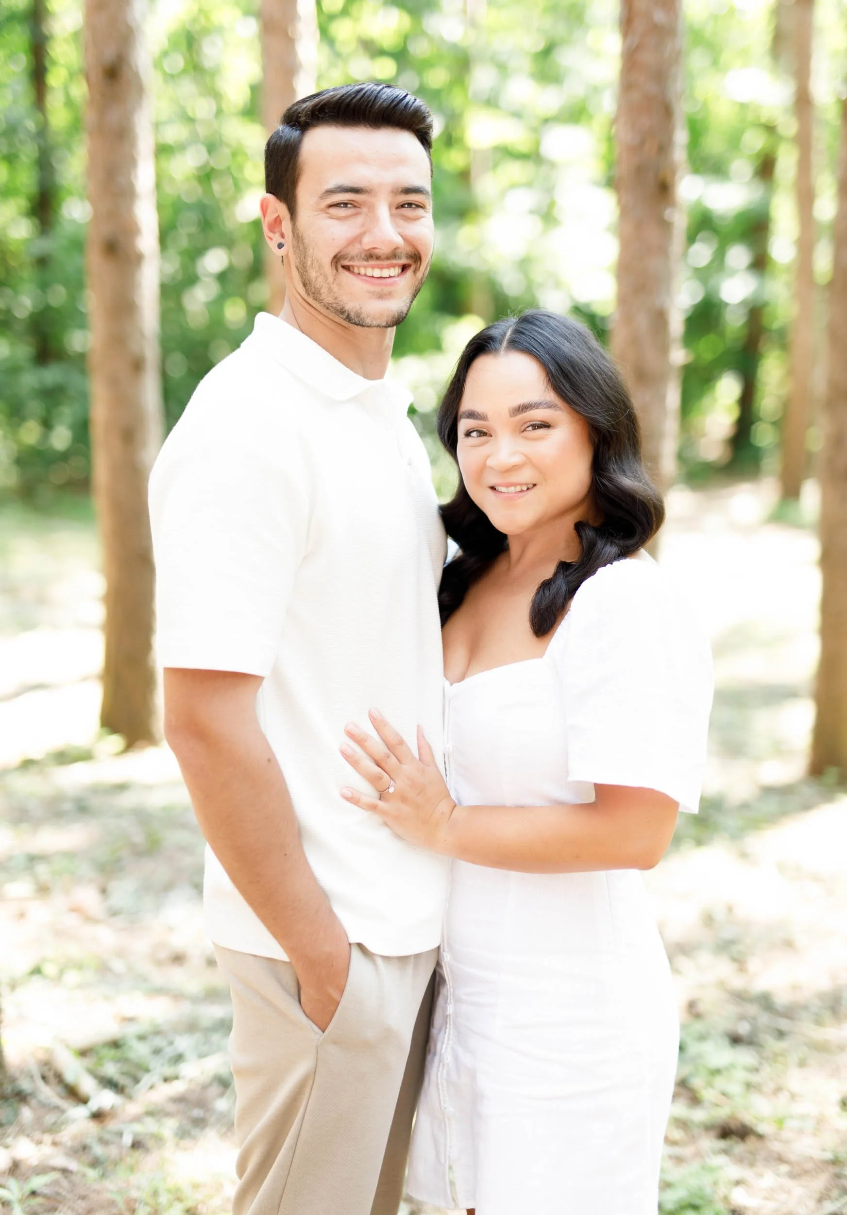 Couple sharing a kiss during their Kortright Centre engagement session in Woodbridge, Ontario