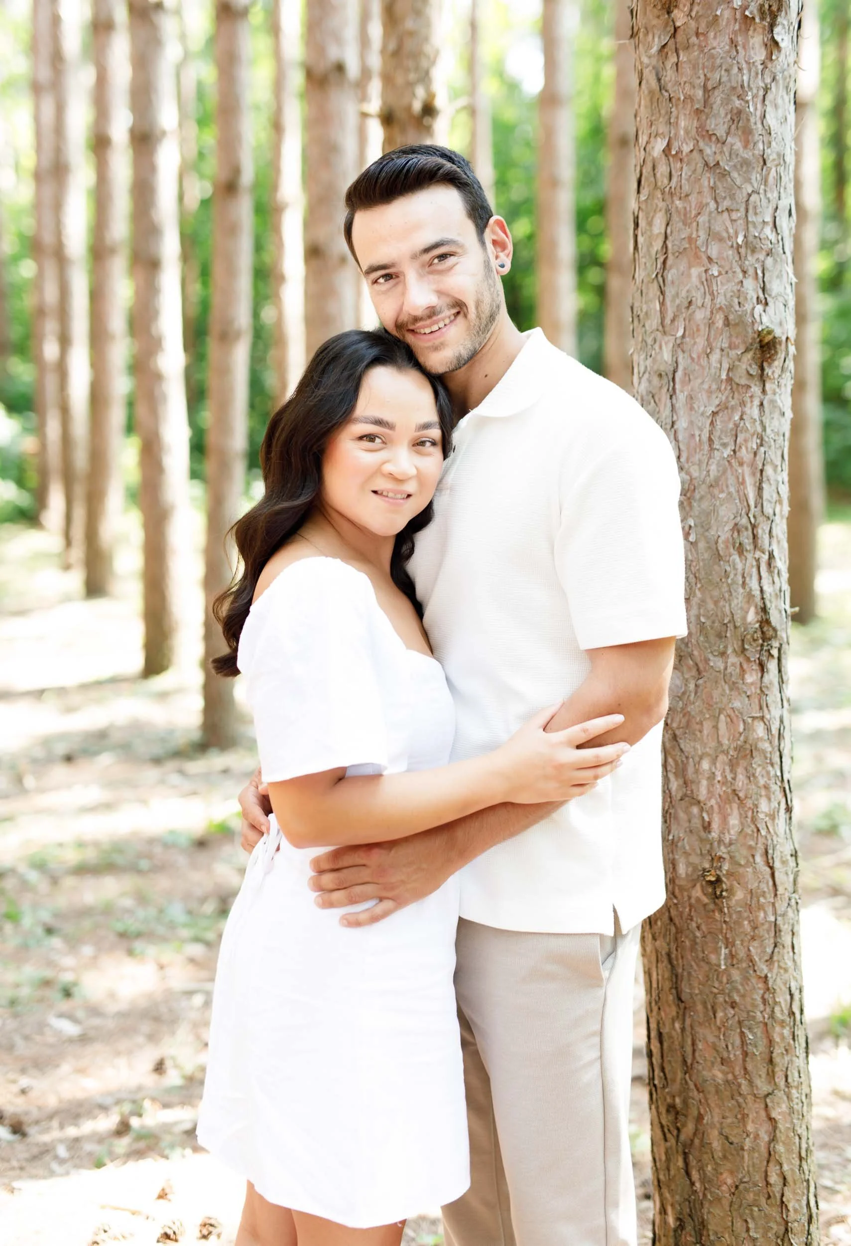 Close-up of couple smiling together during their Kortright Centre engagement session in Woodbridge, Ontario
