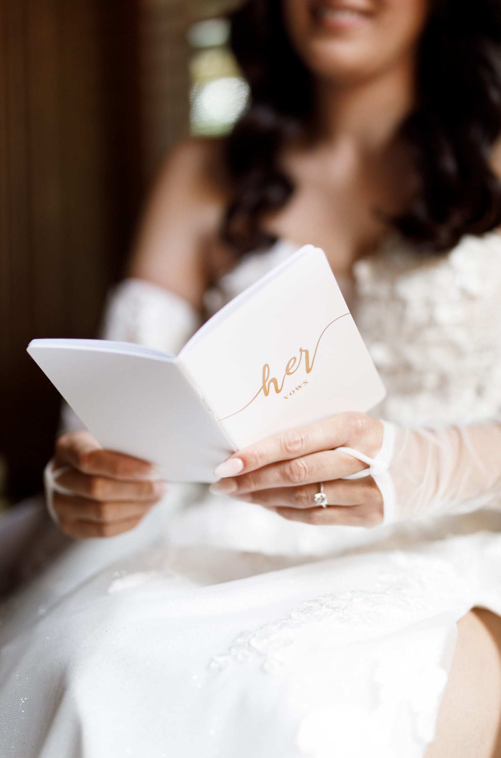 Bride holding her wedding vows during bridal prep at a Cambium Farms wedding in Alton, Ontario