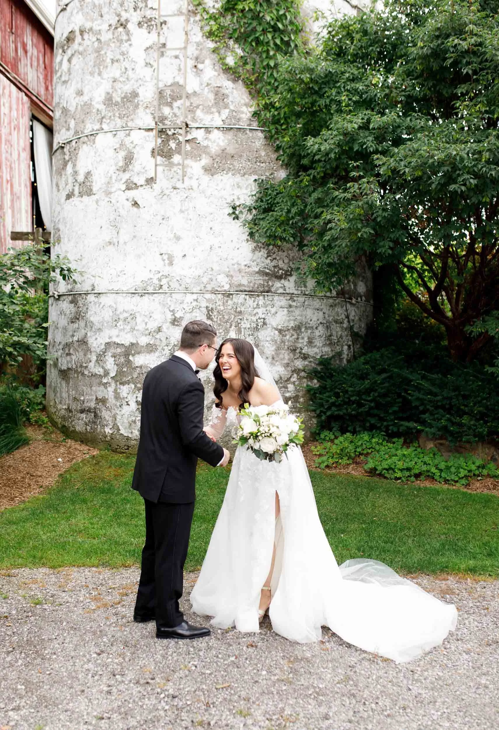 Bride and groom sharing a quiet moment after their first look at a Cambium Farms wedding in Alton, Ontario
