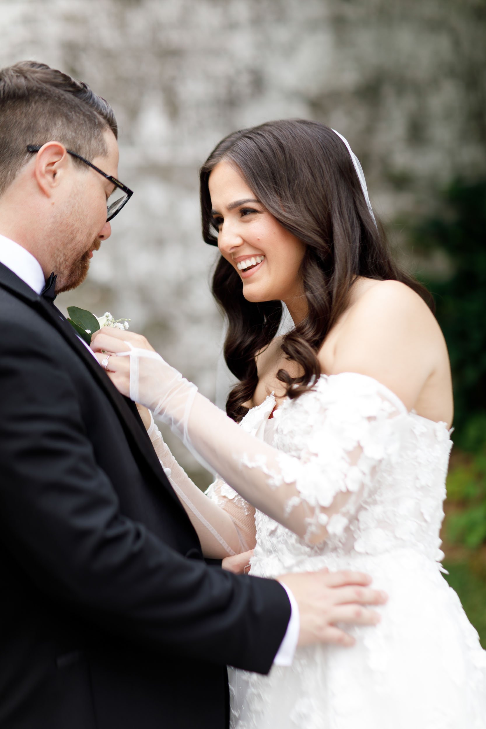 Bride and groom laughing together during wedding portraits at a Cambium Farms wedding in Alton, Ontario