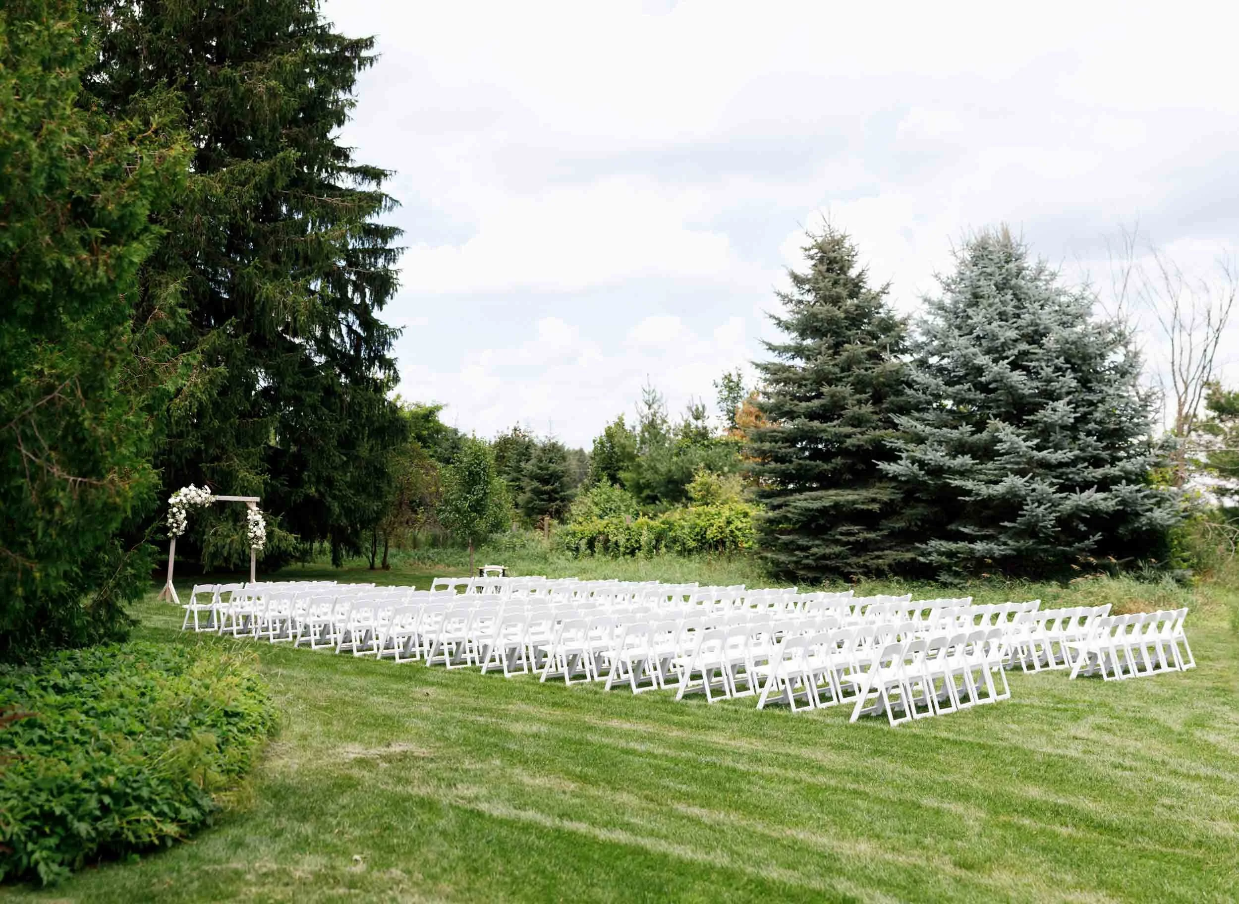 Outdoor wedding ceremony seating at Cambium Farms in Alton, Ontario