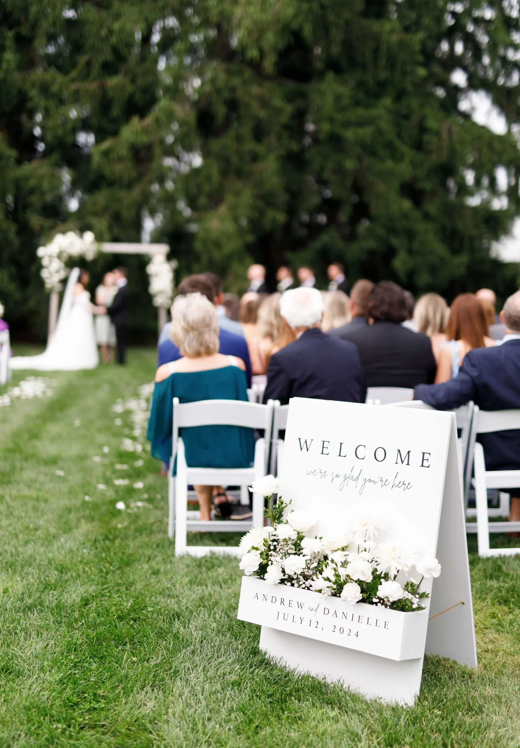 Wide shot of outdoor wedding ceremony at Cambium Farms in Alton, Ontario