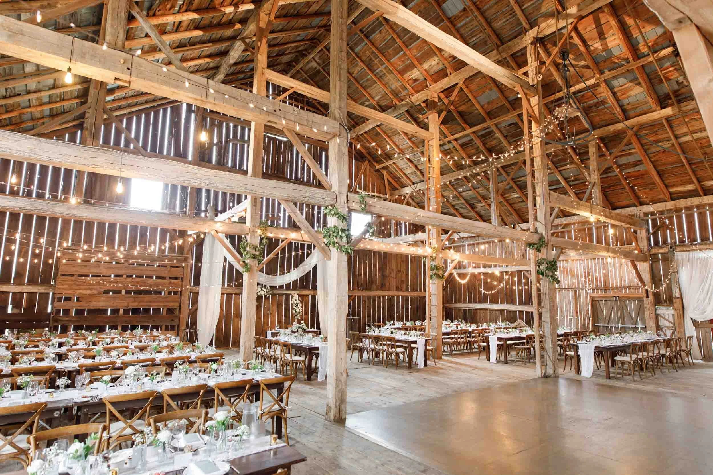 Wide view of the Cambium Farms wedding barn reception in Alton, Ontario