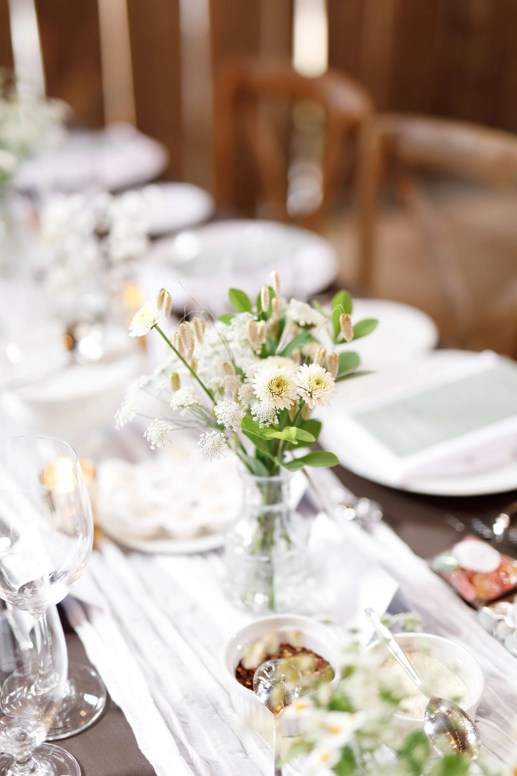 Wedding place settings and table décor at Cambium Farms in Alton, Ontario