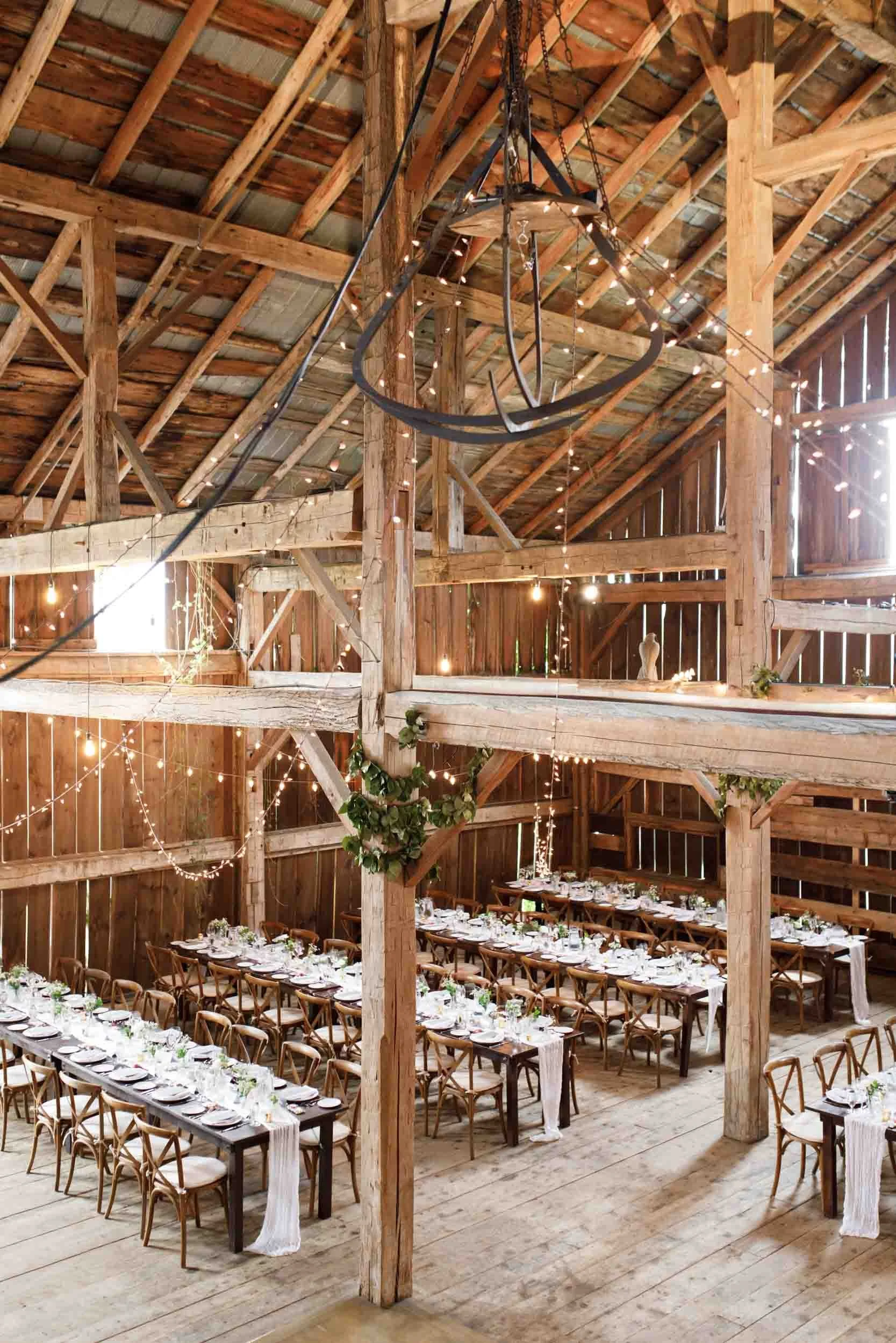 Overhead view of the wedding reception inside the Cambium Farms barn in Alton, Ontario