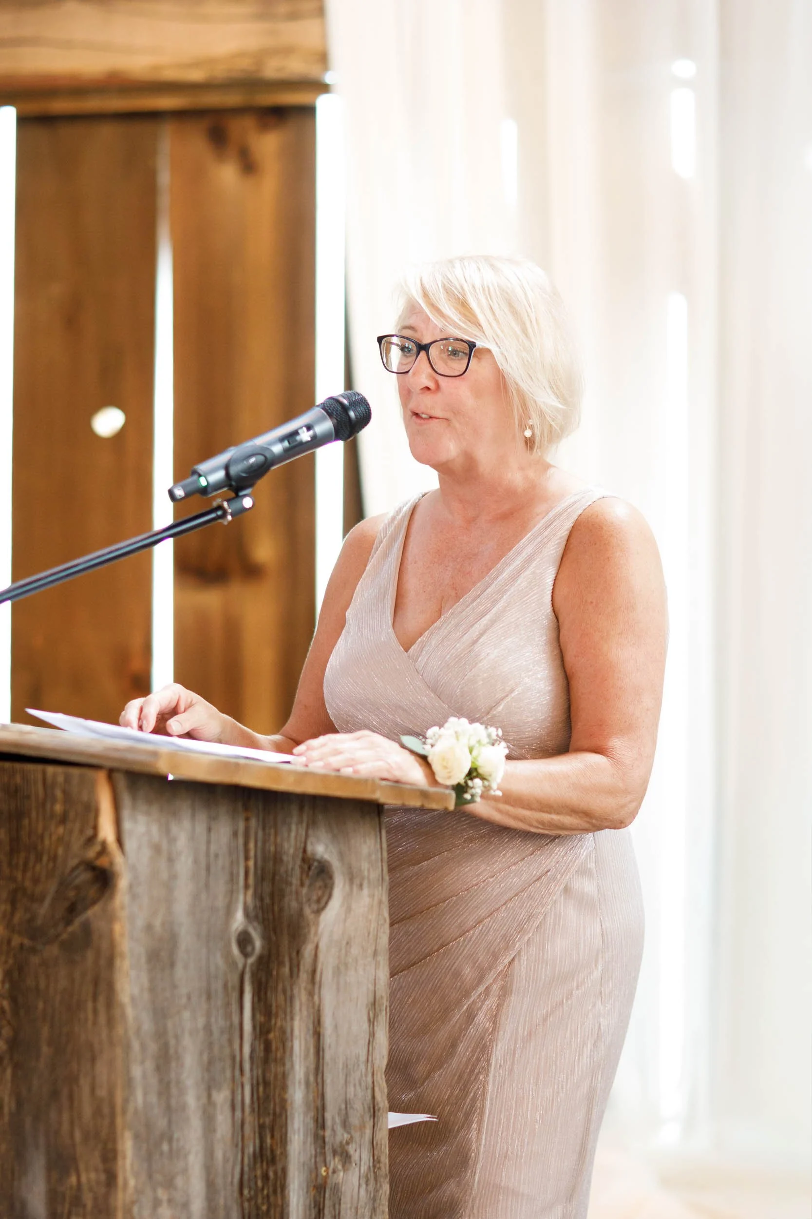 Mother of the bride giving a speech during the Cambium Farms wedding in Alton, Ontario