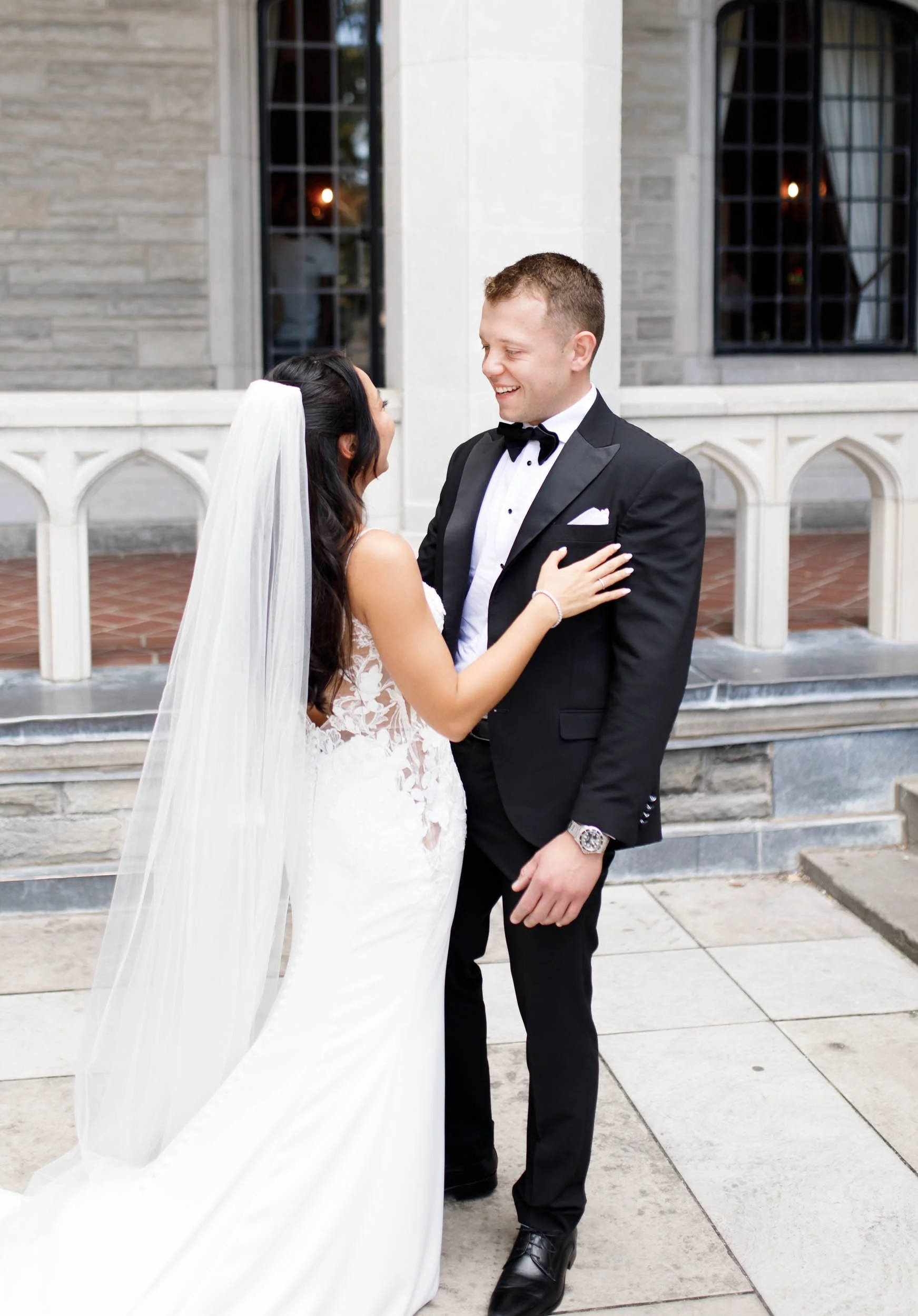 Bride and groom during their first look at Casa Loma in Toronto
