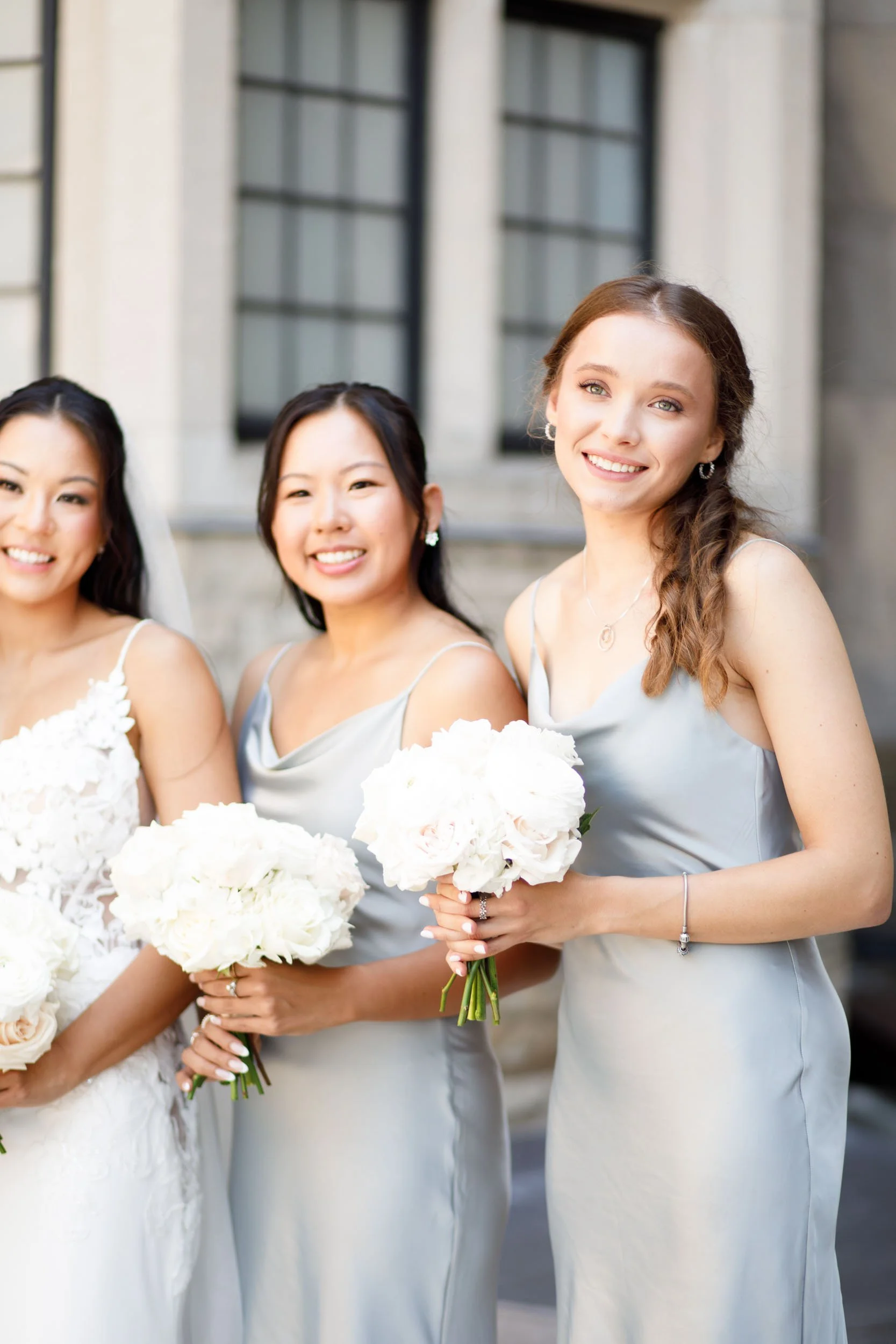 Bridesmaids posing in the Casa Loma courtyard in Toronto