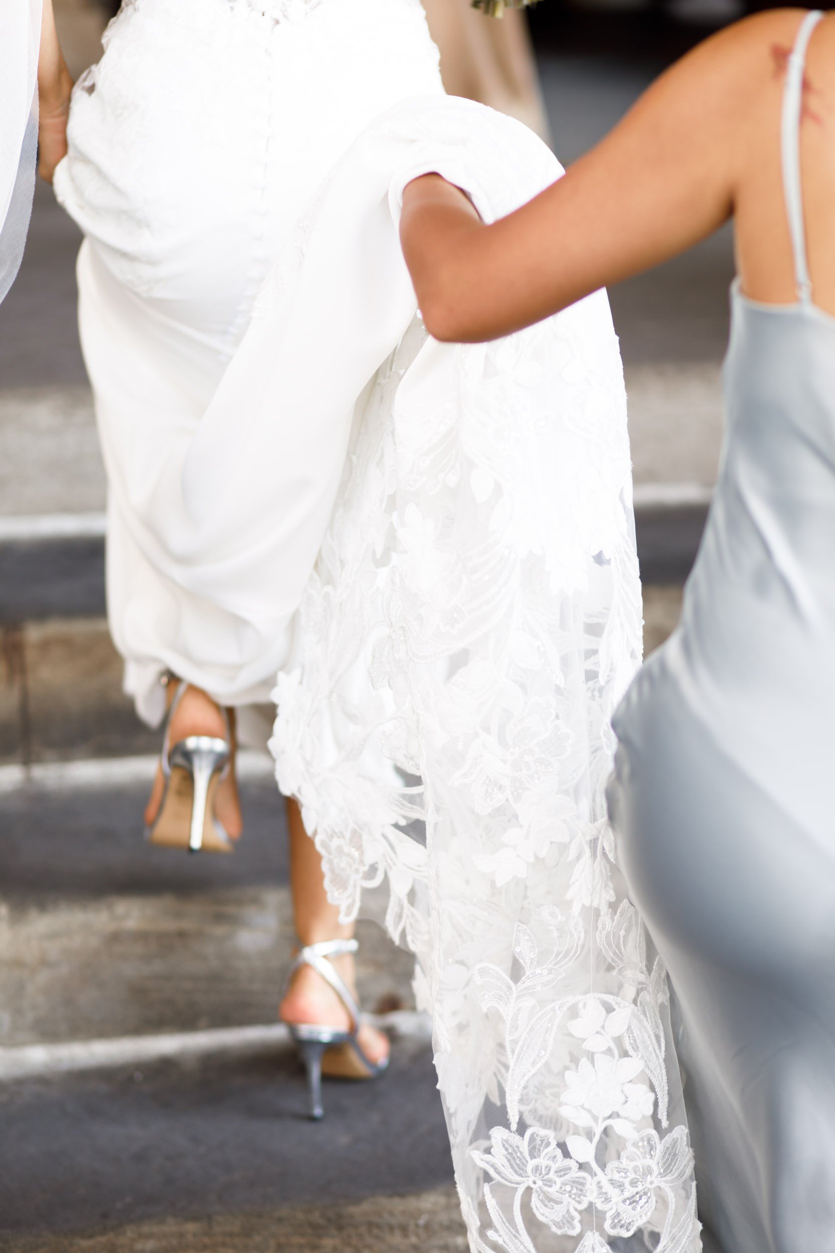 Detail of the bride’s wedding dress and heels at Casa Loma in Toronto