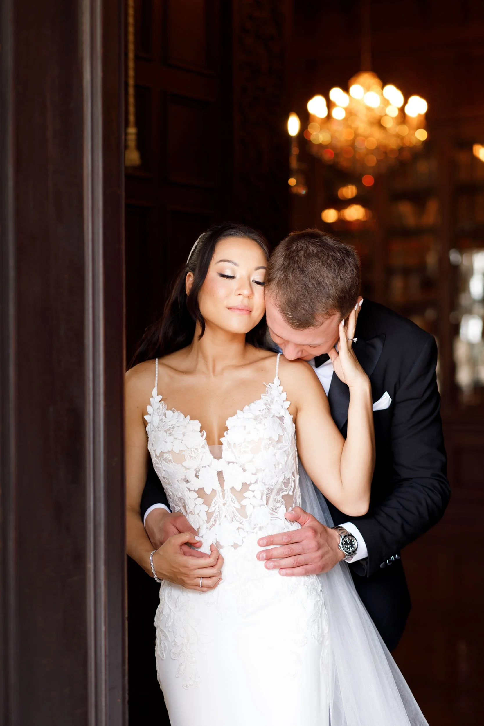 Bride and groom sharing a quiet moment inside Casa Loma