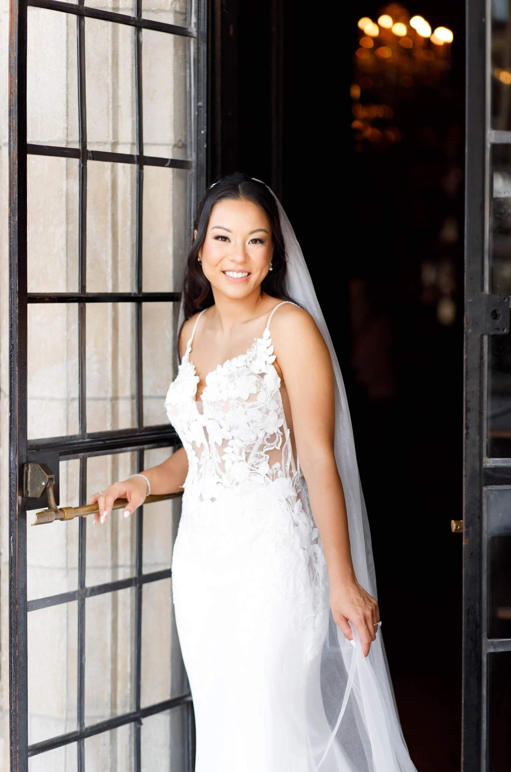 Bride stepping through the Casa Loma doorway