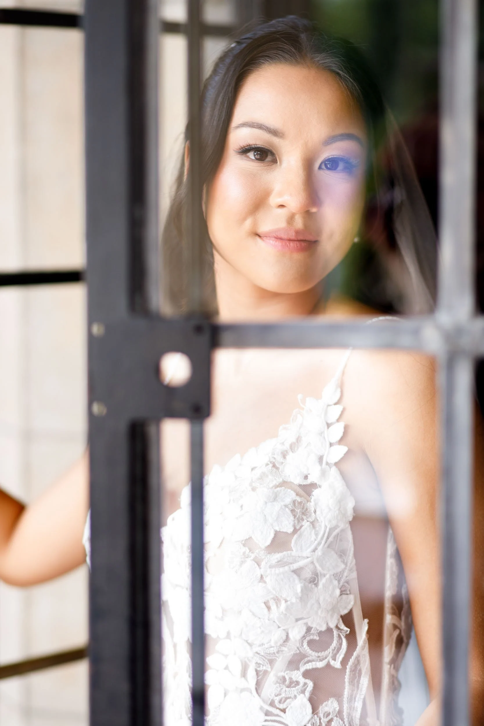 Bride framed by the Casa Loma doors