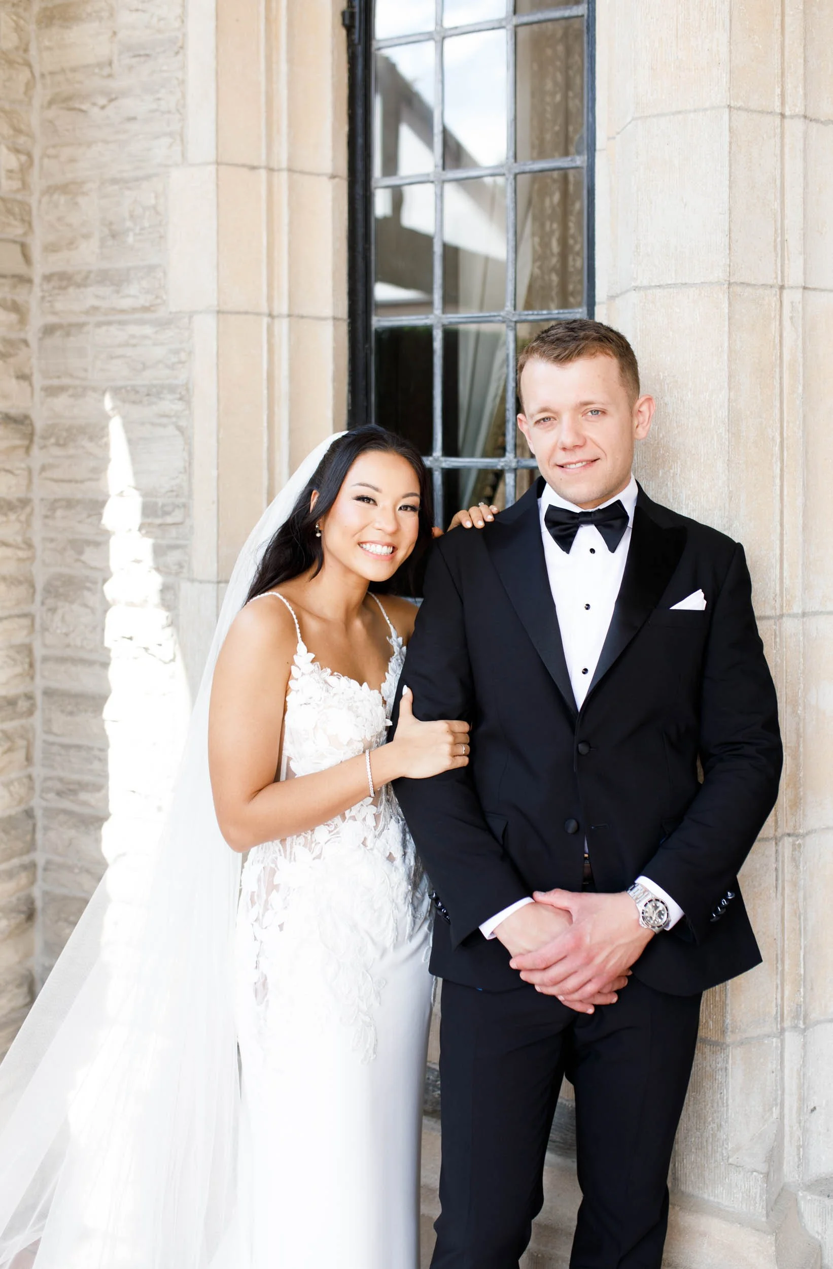 Bride and groom portrait standing together at Casa Loma