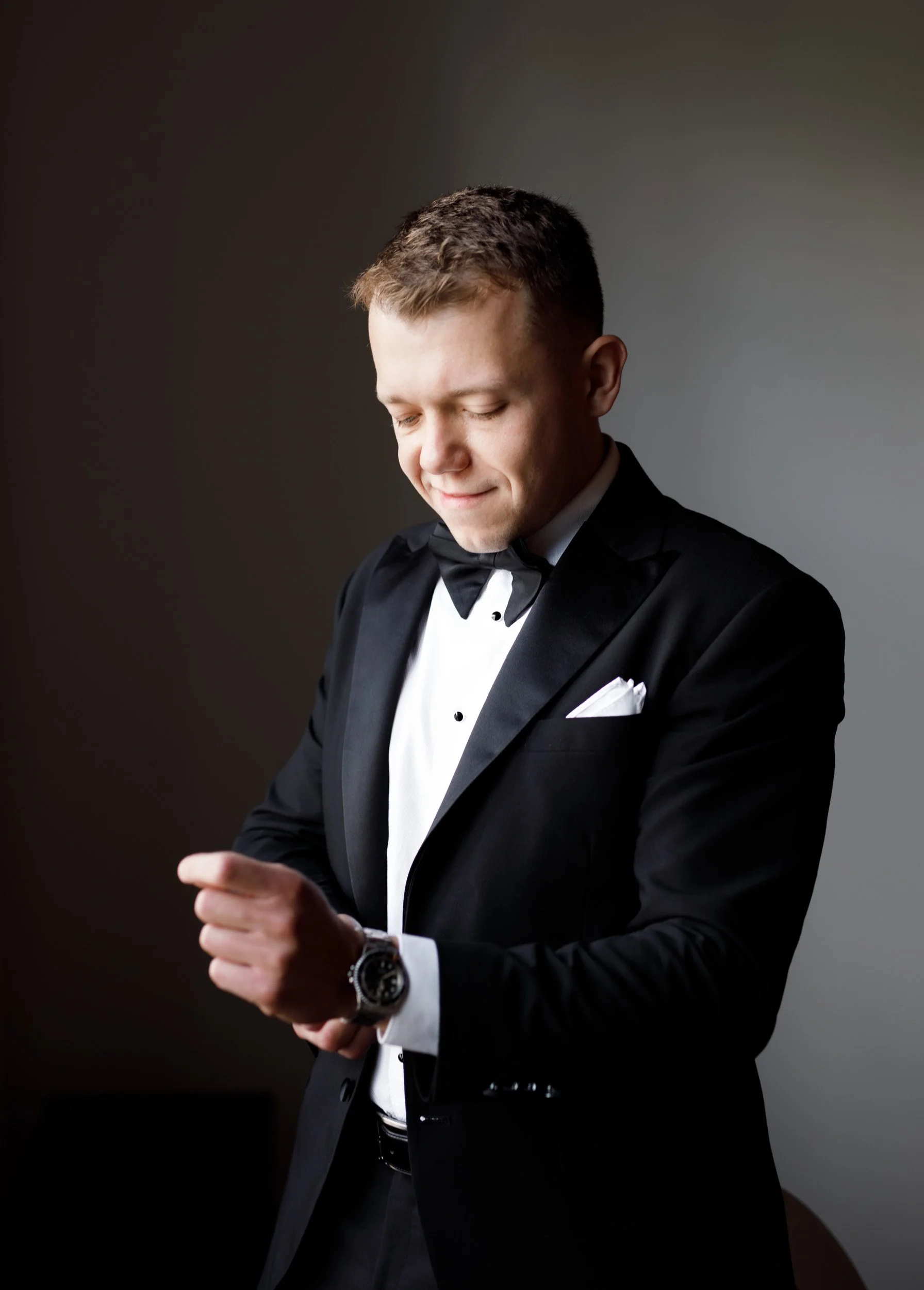 Portrait of the groom getting ready for his Toronto wedding at St. George’s Golf Club
