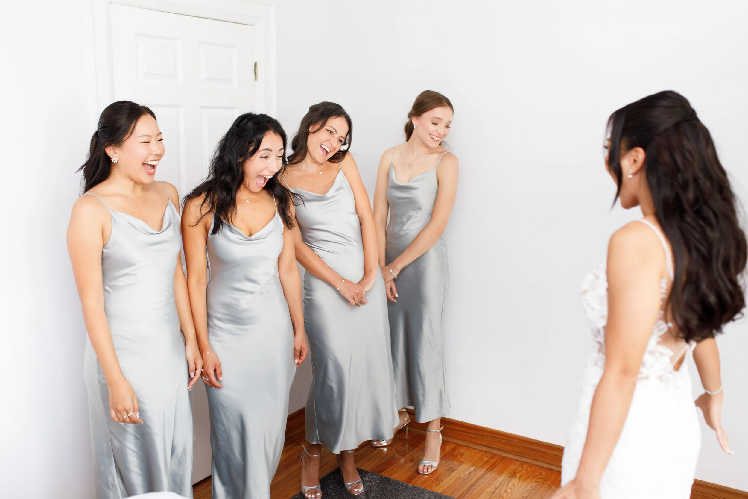 Bridesmaids lined up during wedding prep in Toronto