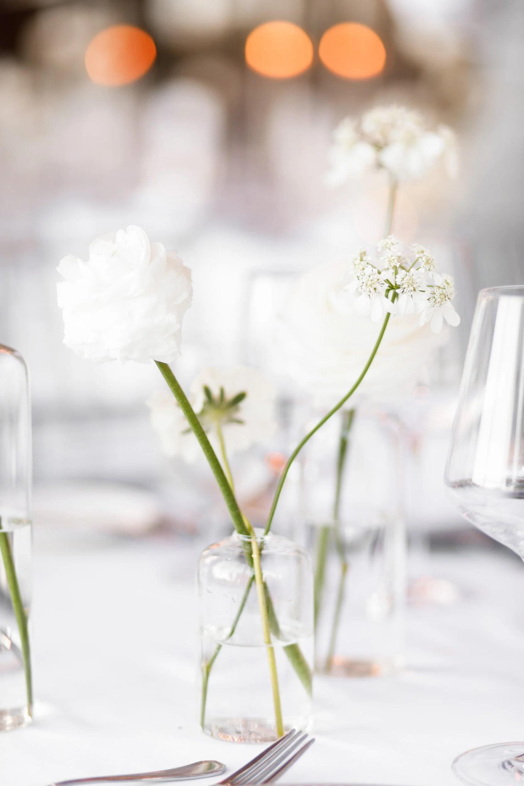 Wedding table floral arrangement in soft white tones at St. George’s Golf Club in Toronto