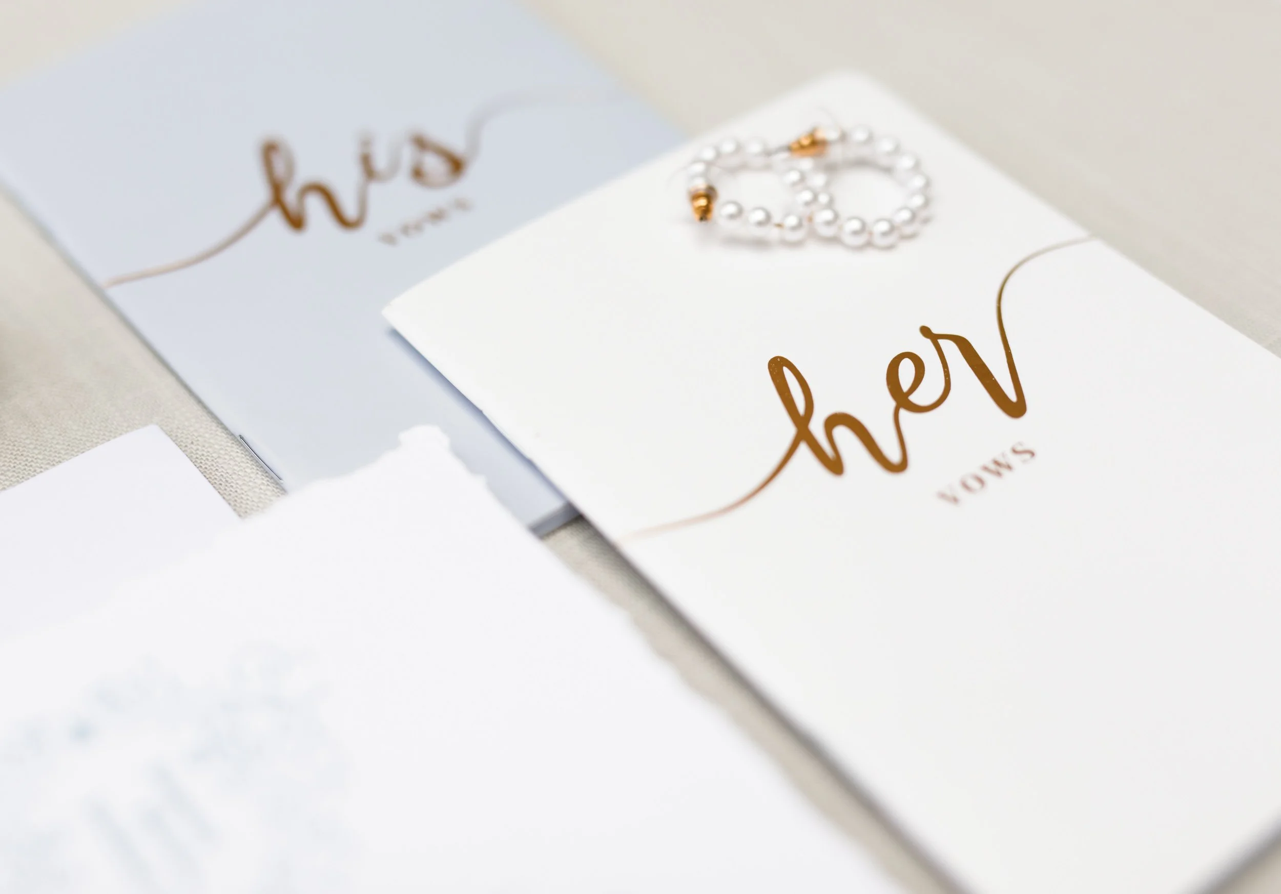Wedding invitation suite and engagement rings from a Pearle Hotel wedding in Burlington Ontario