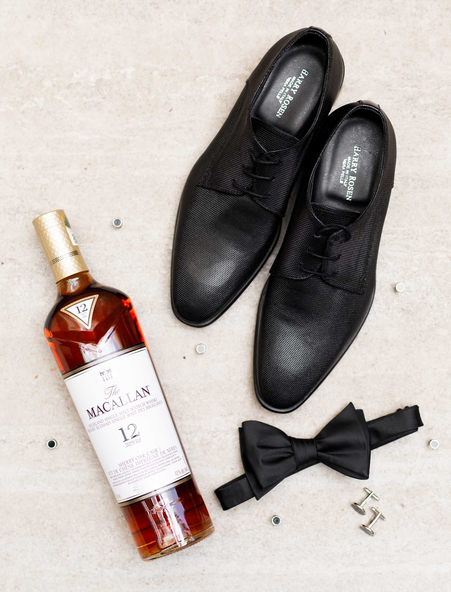 Groom’s shoes and whisky from a Pearle Hotel wedding in Burlington Ontario