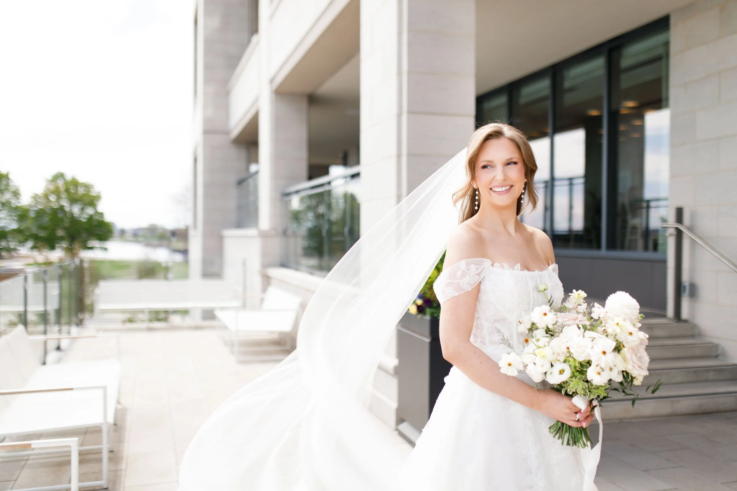 Bride standing outside the Pearle Hotel in Burlington Ontario on her wedding day