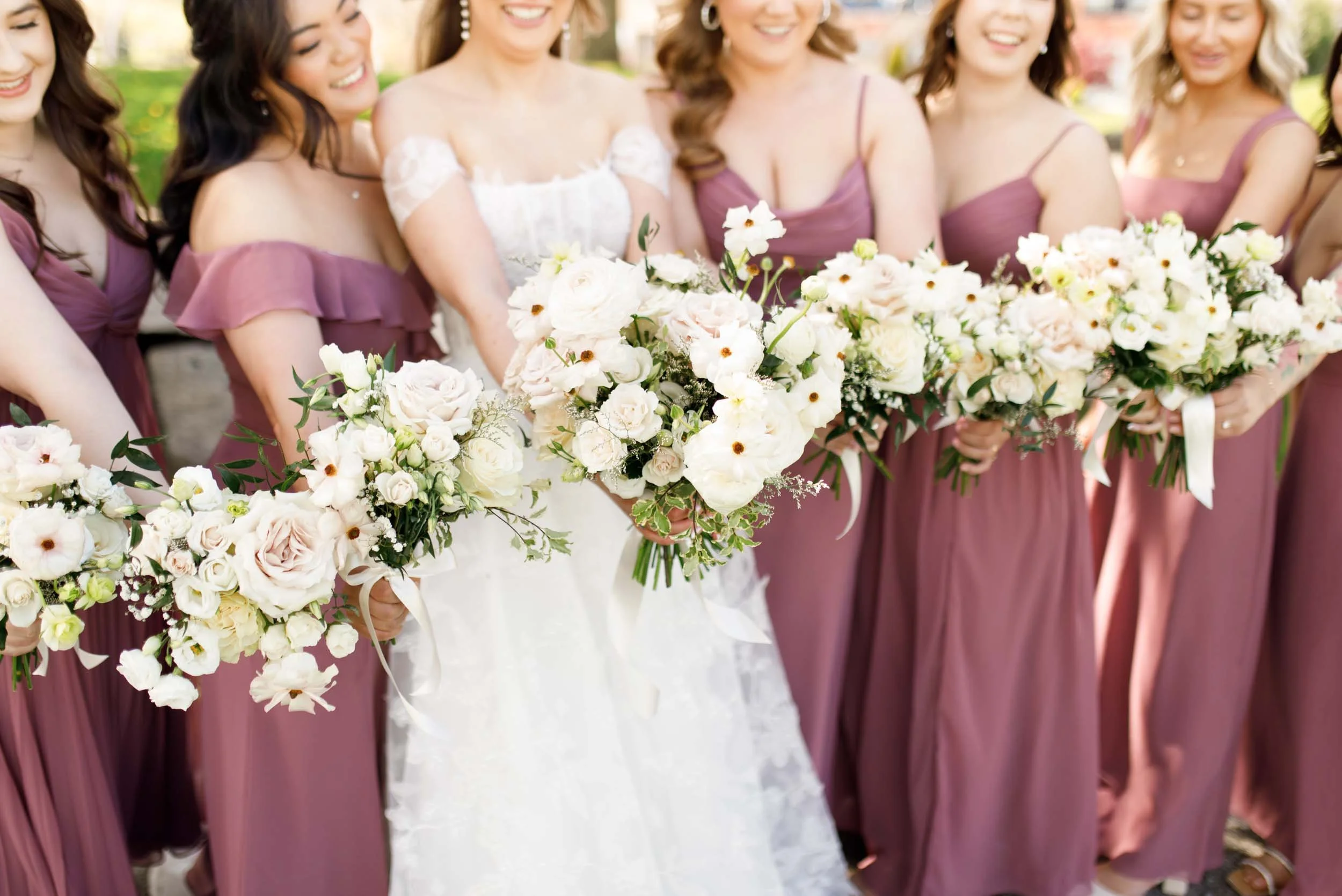 Close up of bridesmaids bouquets at a Pearle Hotel wedding in Burlington Ontario