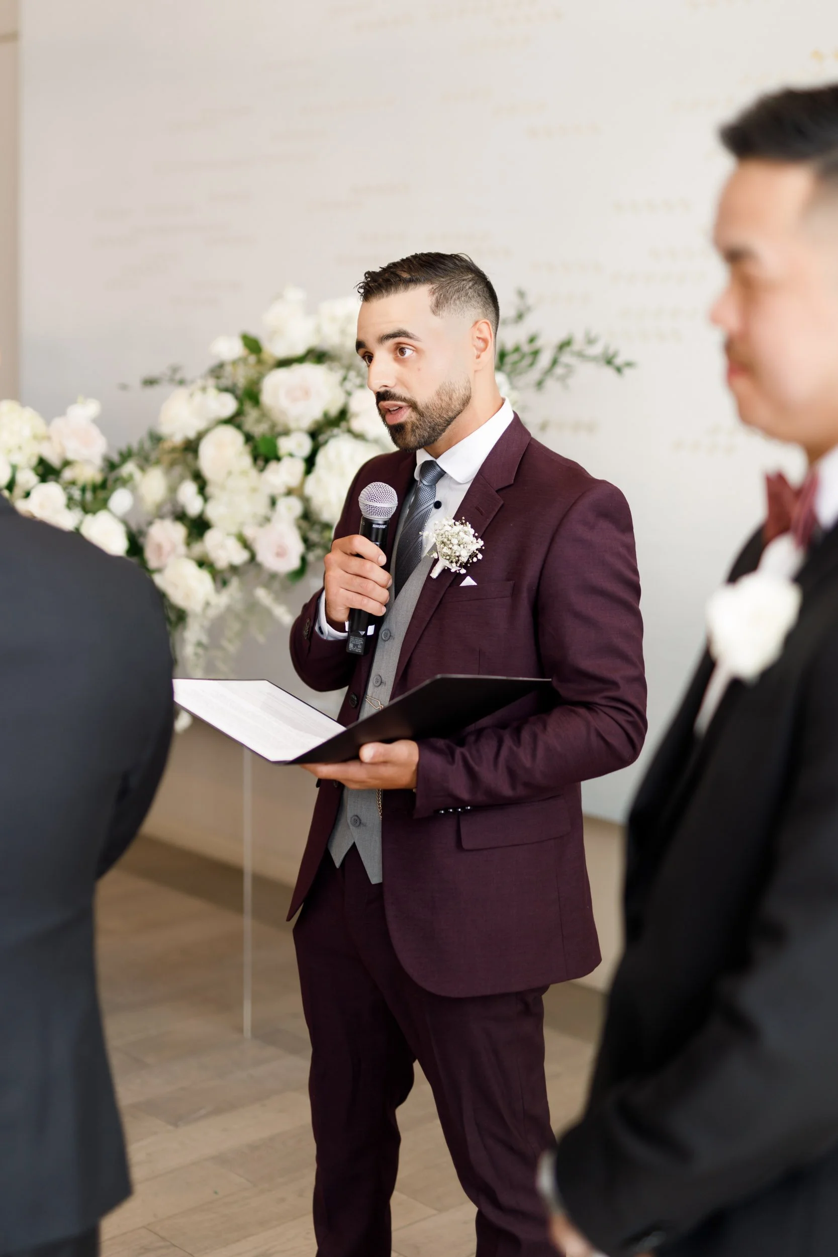 Officiant speaking during a Pearle Hotel wedding ceremony in Burlington Ontario