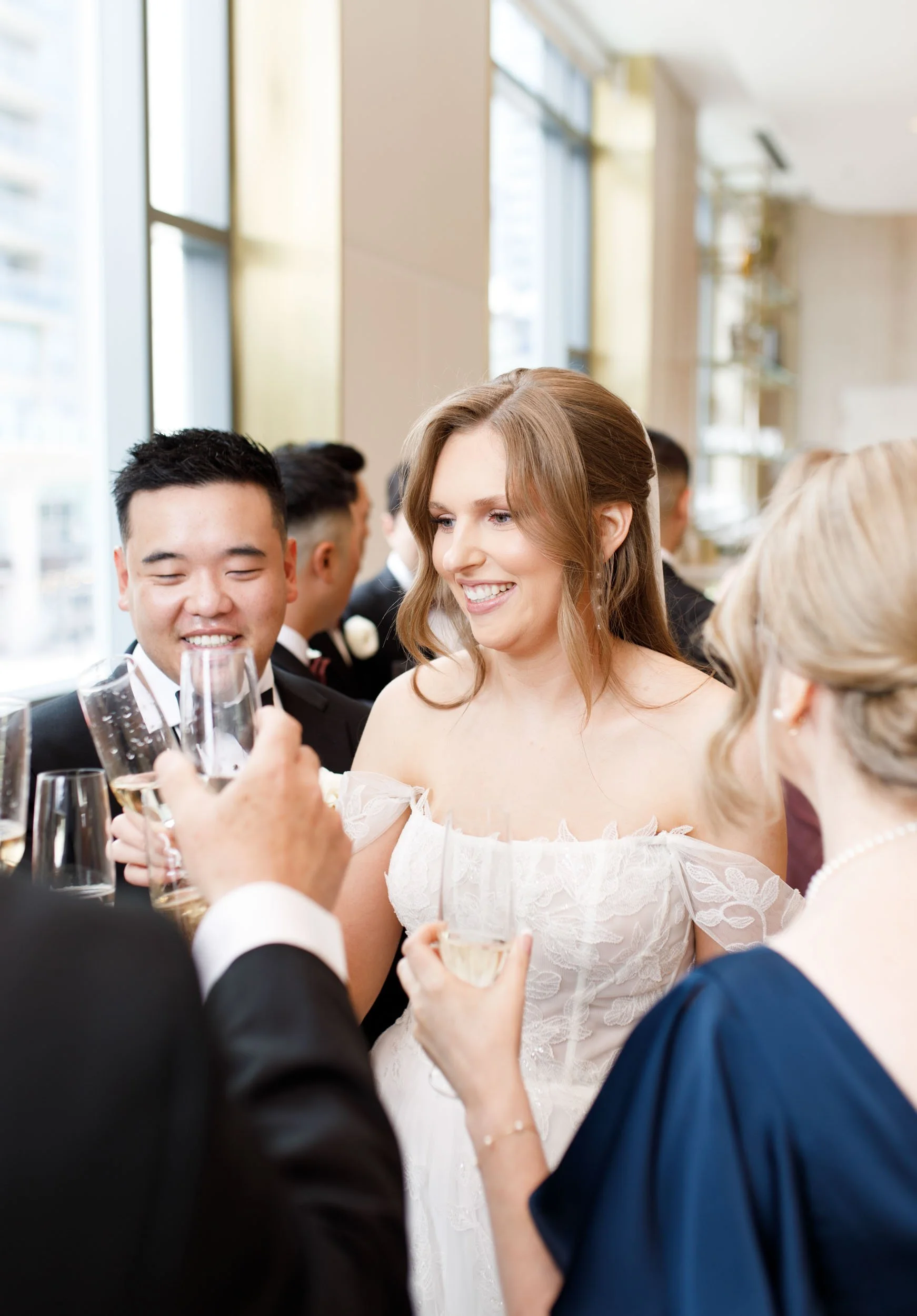 Bride and groom celebrating with guests at a Pearle Hotel wedding in Burlington Ontario