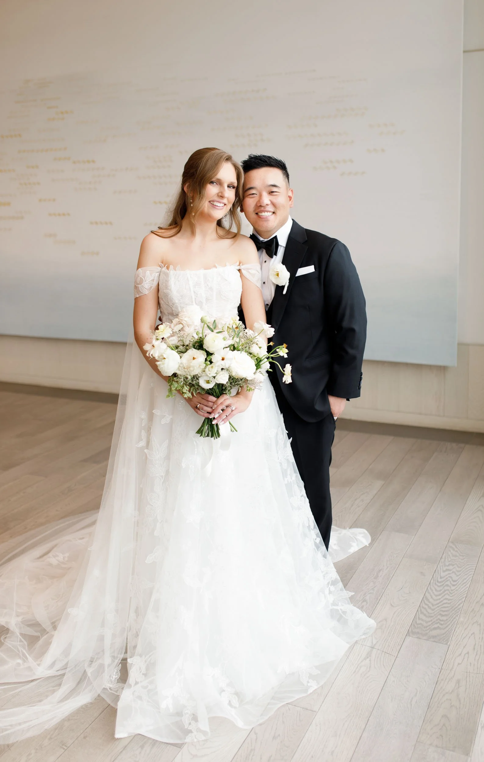 Bride and groom posing together during their Pearle Hotel wedding in Burlington Ontario