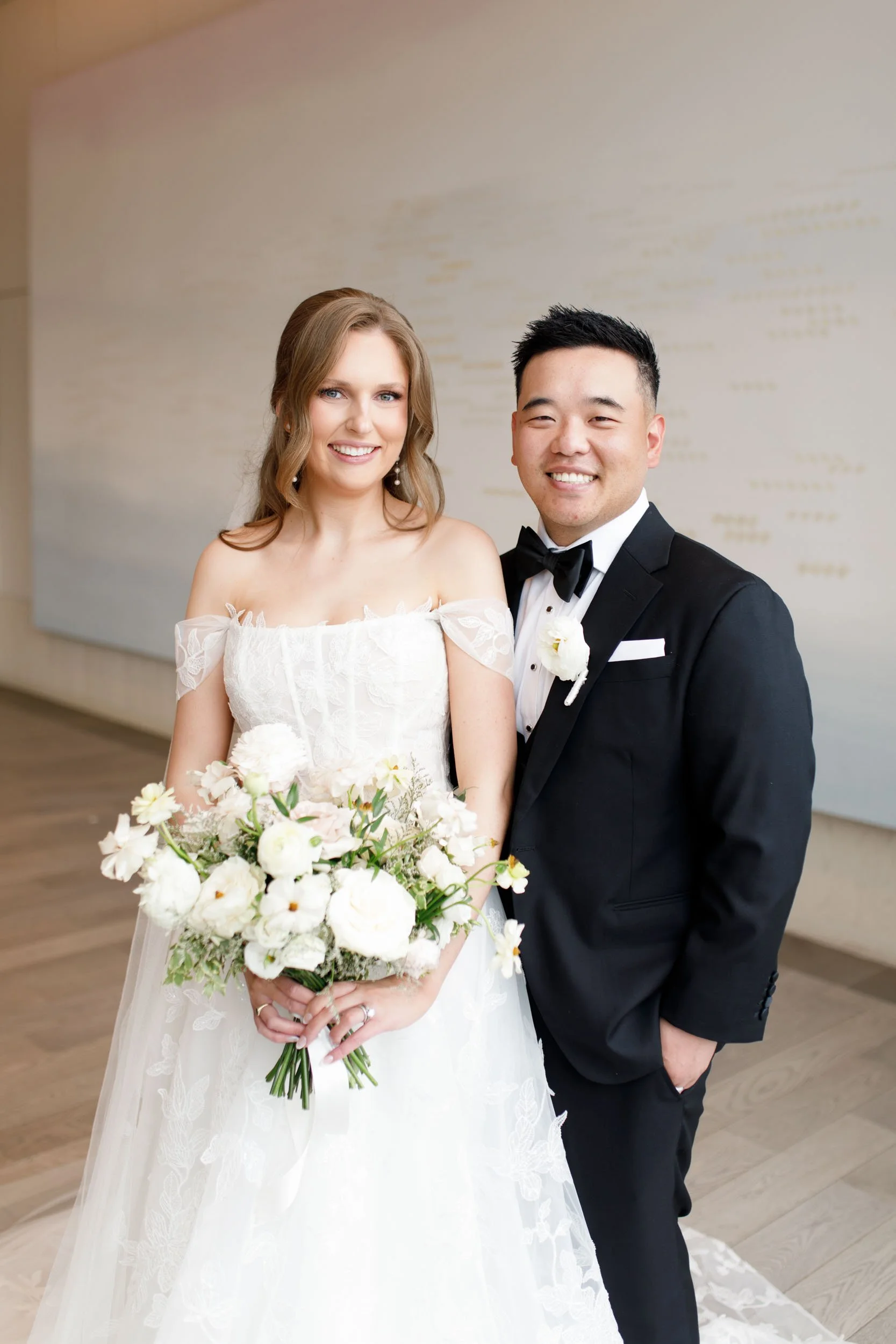 Bride and groom standing together at the Pearle Hotel in Burlington Ontario
