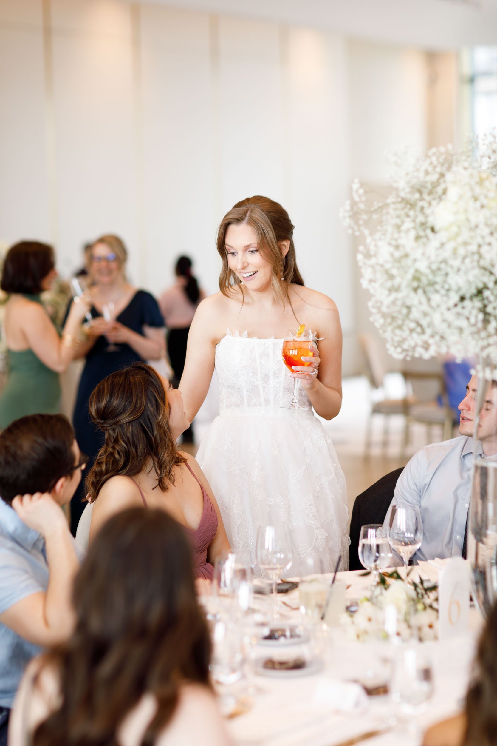 Bride candid at wedding reception at the Pearle Hotel in Burlington Ontario